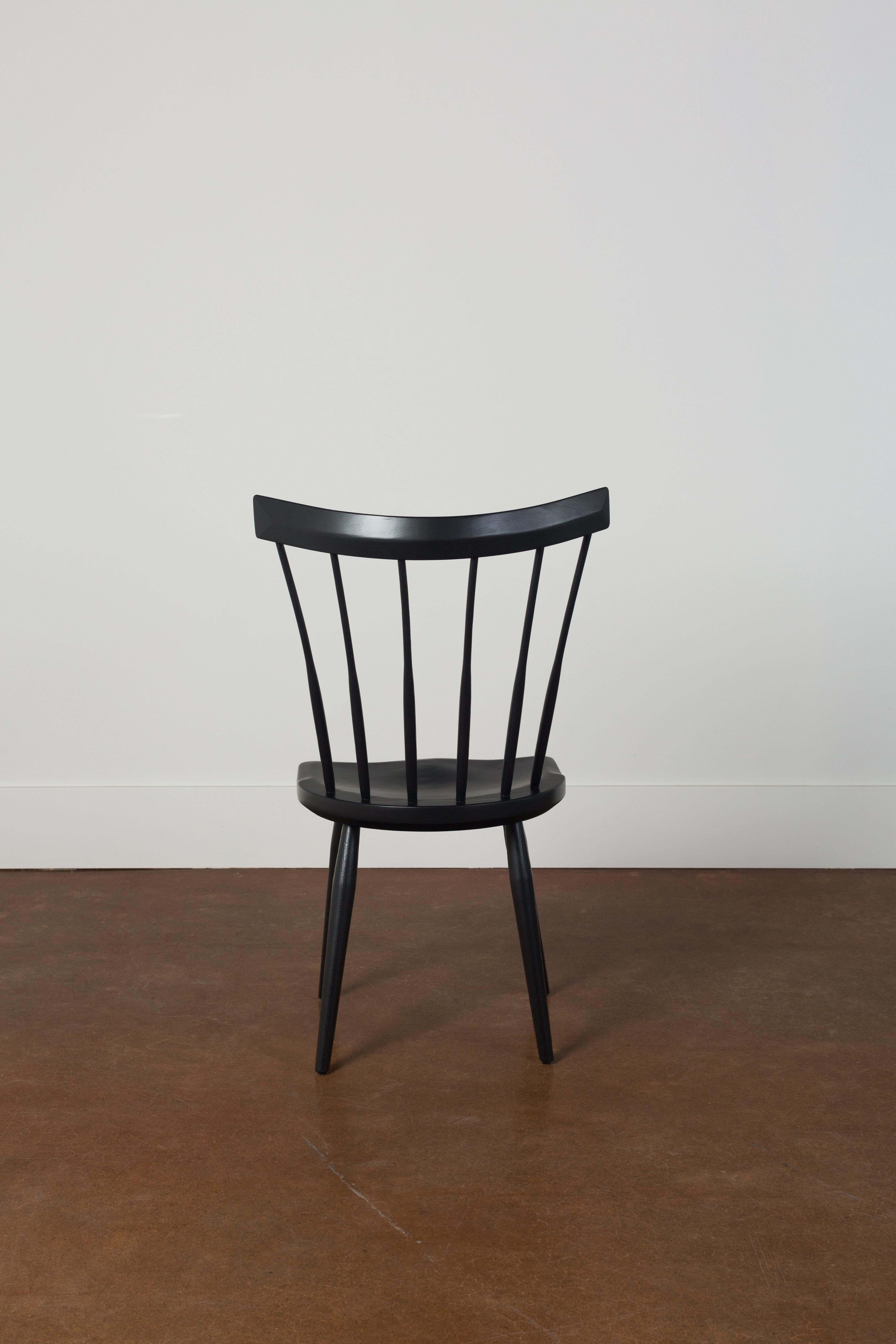 A Windsor chair that’s more city than country.

If you’ve ever visited an Indigo bookstore, you may have already enjoyed the comfort of our iconic modern mid-back Windsor chairs. Now, you can take that comfort and craftsmanship home.

This side