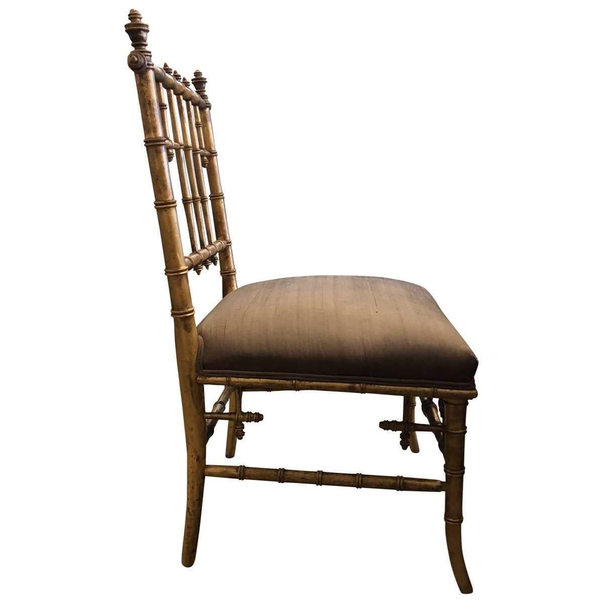 This bamboo chair it is an elegant style, characterized by ornate carvings, dark woods, and heavy luxurious fabrics.
Materials: Giltwood, fabric
Dimensions:
Width 17.50