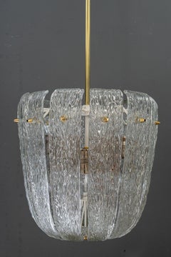 Modern mid century chandelier with brass and curved textured glass by J.T Kalmar