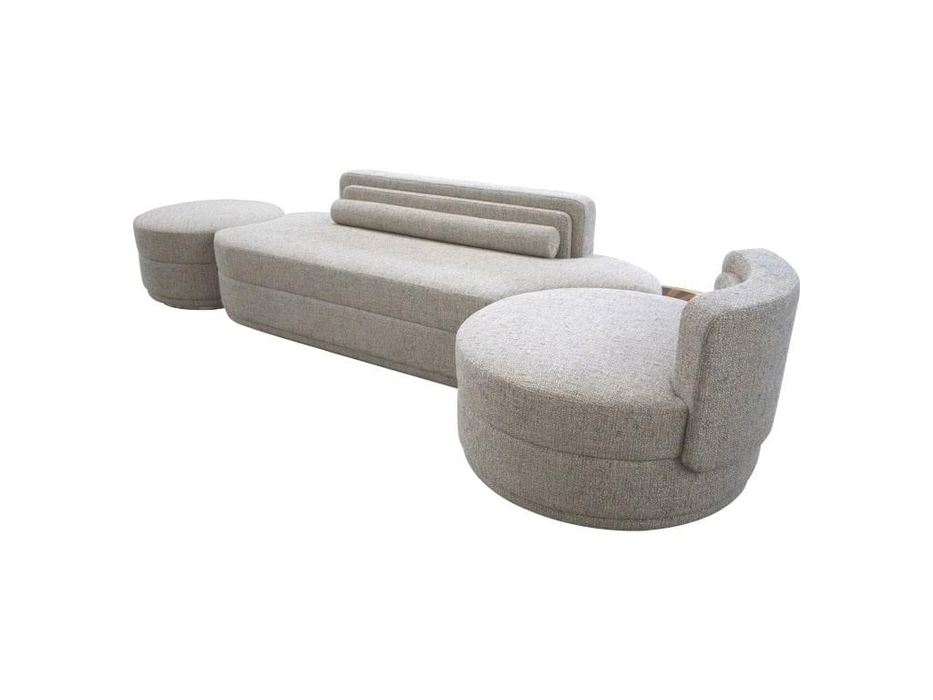 Cluedo Sofa is a curved modern sofa upholstered in velvet, with surprising side table marquetry details incorporated. A luxury sofa offers a modern vibe to any contemporary living room project.

Materials: Upholstered in Velvet; Base in Polished