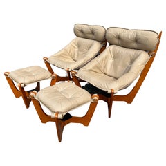 Modern Mid Century Style tan leather Luna sling lounge chair and ottoman