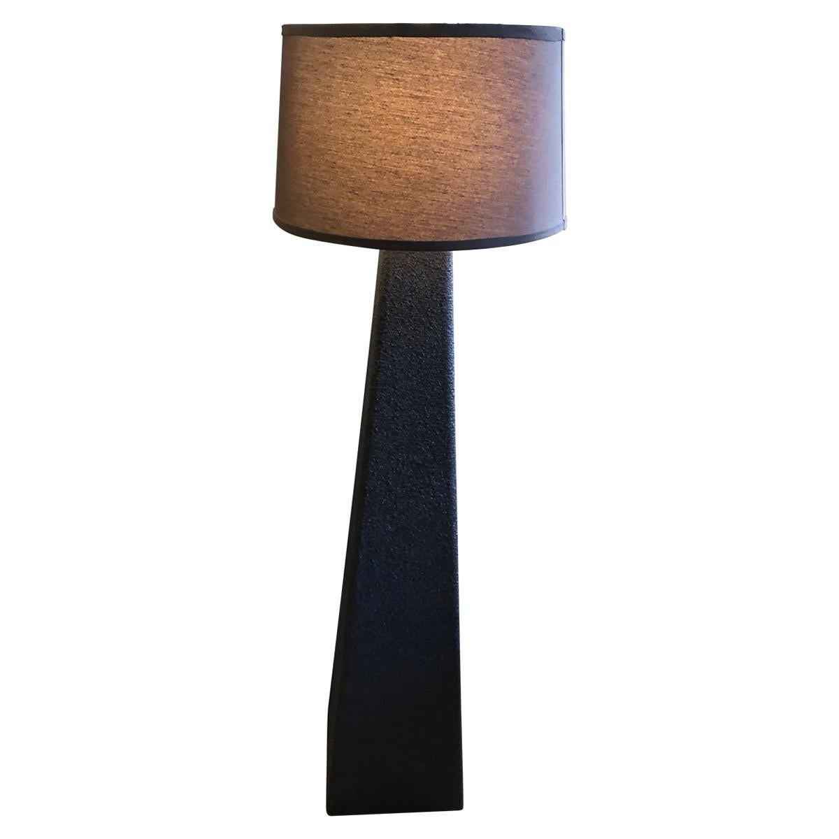 Black textured lamp, comes with a brown cotton drum shade.


Materials: Resin, cotton
Dimensions:
Width 11