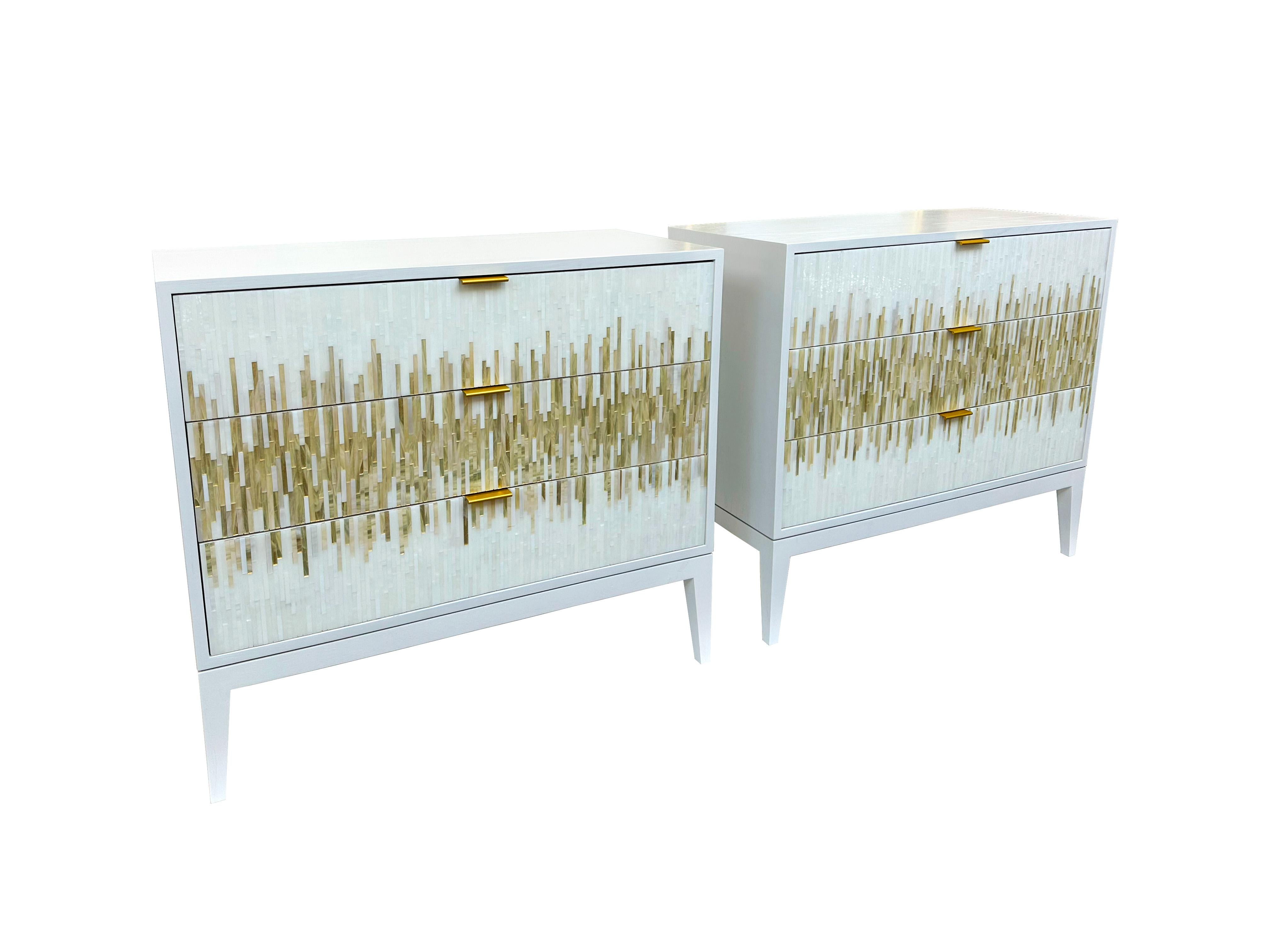 Introducing the Milano Gold 2-Drawer Nightstand: the ultimate expression of modern luxury and sophistication. Hand crafted with the utmost attention to detail, this exquisite piece features sleek wooden Milano legs, introducing an element of