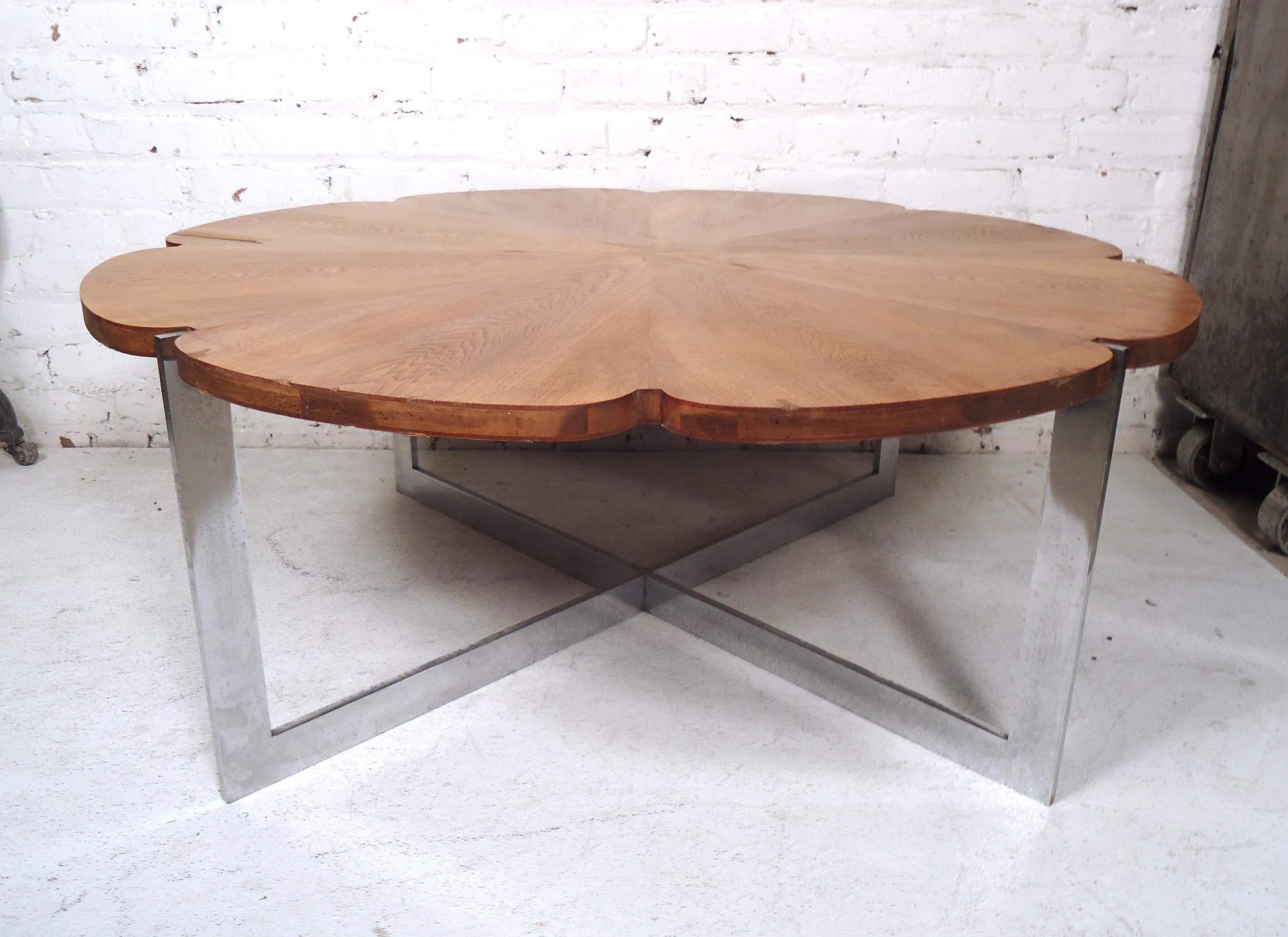Gorgeous Mid-Century Modern Milo Baughman coffee table features rich wood grain top and metal leg frames.
(Please confirm item location - NY or NJ - with dealer).