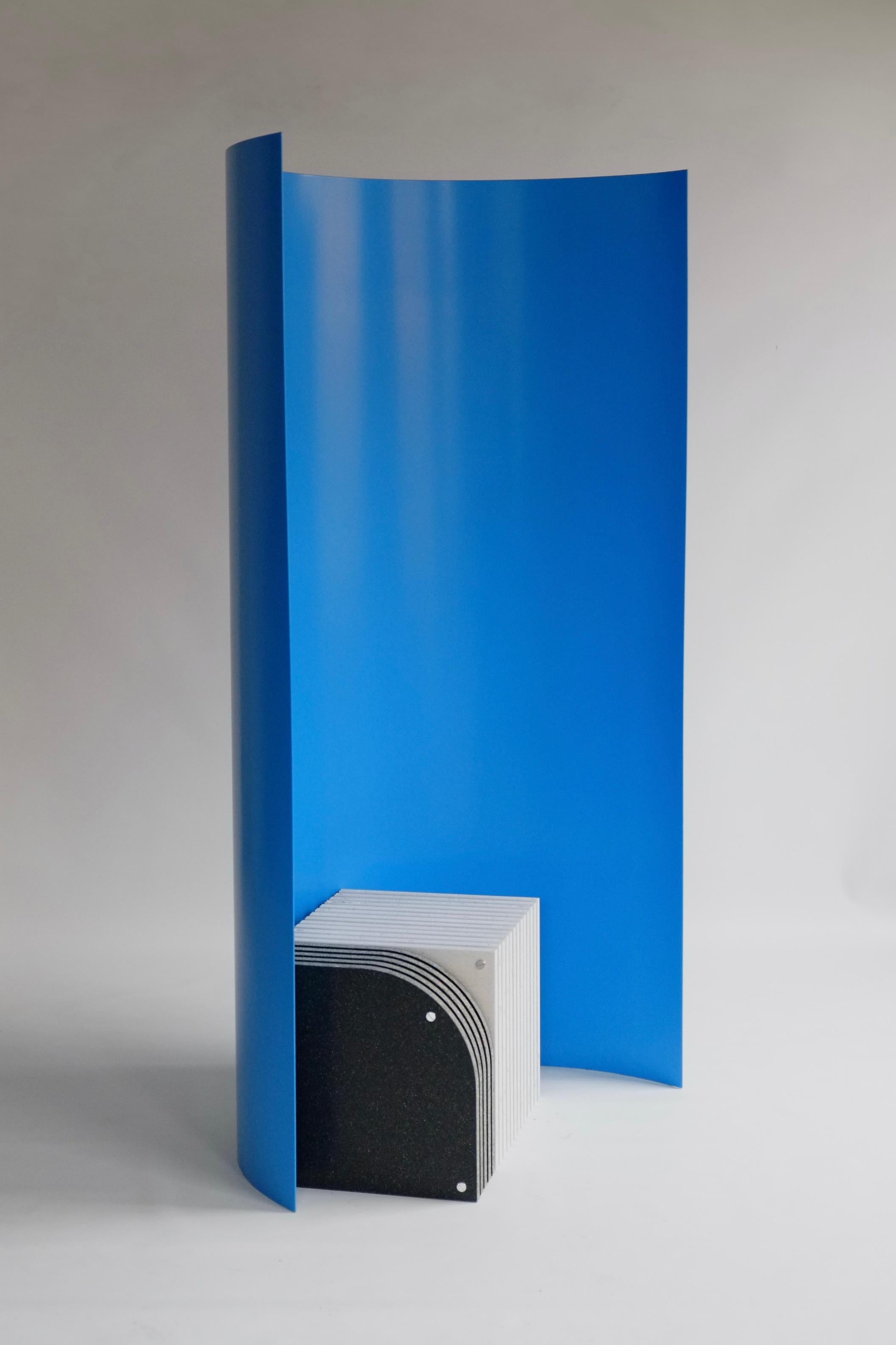 The Gray Screen is a freestanding room divider named after the iconic modernist architect-designer Eileen Gray, a lover of screens. The large powder-coated aluminium curves introduce a mass of vibrant colour into an interior. The screen can be used