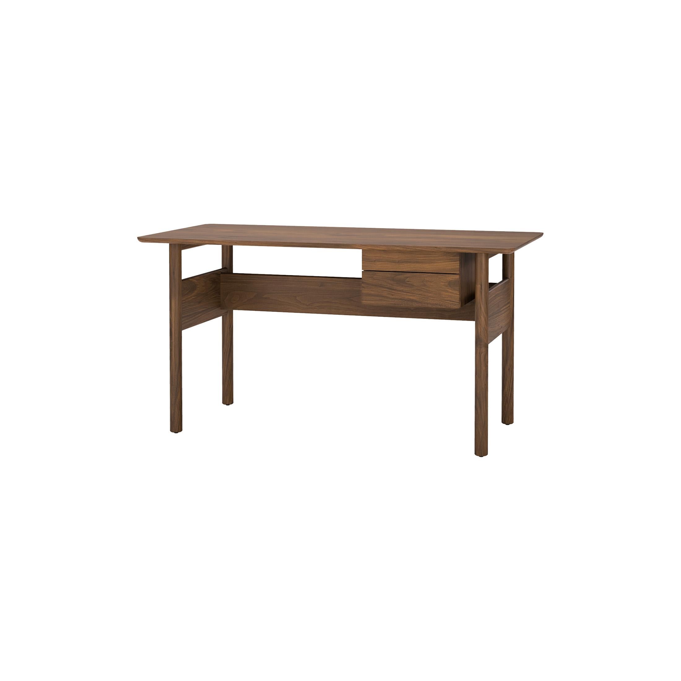 The Modern Minimal Writing Desk's all solid wood construction is evident throughout. Turned legs, radiused edges and soft corners all contribute to the organic nature of this design. The Modern Minimal Writing Desk is an elegant and modern workspace