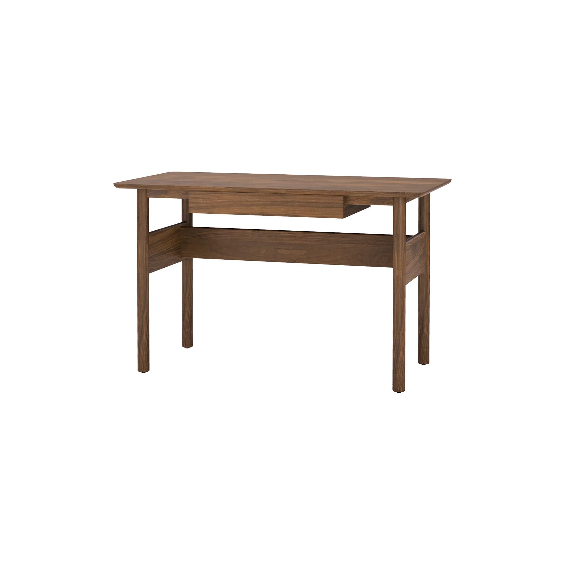 The Modern Minimal Writing Desk's all solid wood construction is evident throughout. Turned legs, radiused edges and soft corners all contribute to the organic nature of this design. The Modern Minimal Writing Desk is an elegant and modern workspace