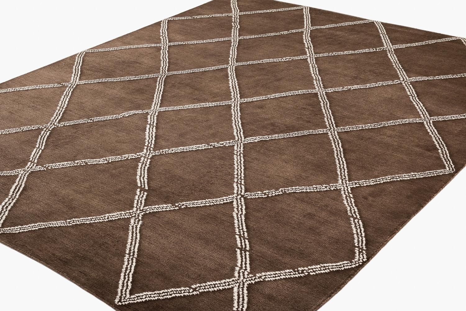 Crosshatch is a classic design that blends modern sensibility with a gentle nod to traditional Tribal and Moroccan designs. The distinct irregular diamonds are woven in a natural unbleached creamy white and the background is a rich natural cocoa