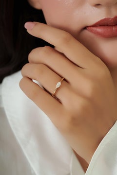 Modern Minimalist Marquise Cut Diamond Solitaire Ring in 14K Yellow Gold