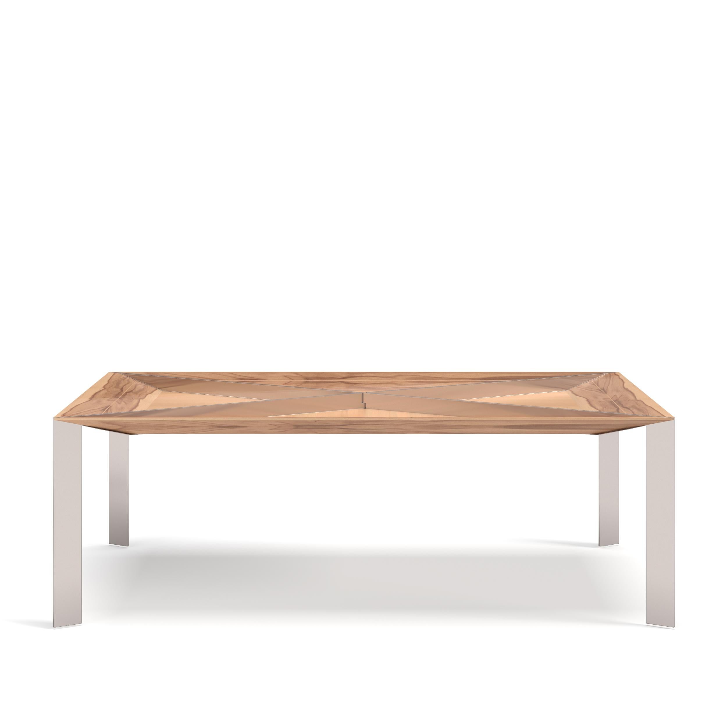 La table à manger rectangulaire Convex est faite pour durer des générations et présente des placages de bois exquis qui équilibrent magnifiquement la simplicité de la forme.

Plateau de table : Bois satiné et verre.
Pieds : acier inoxydable