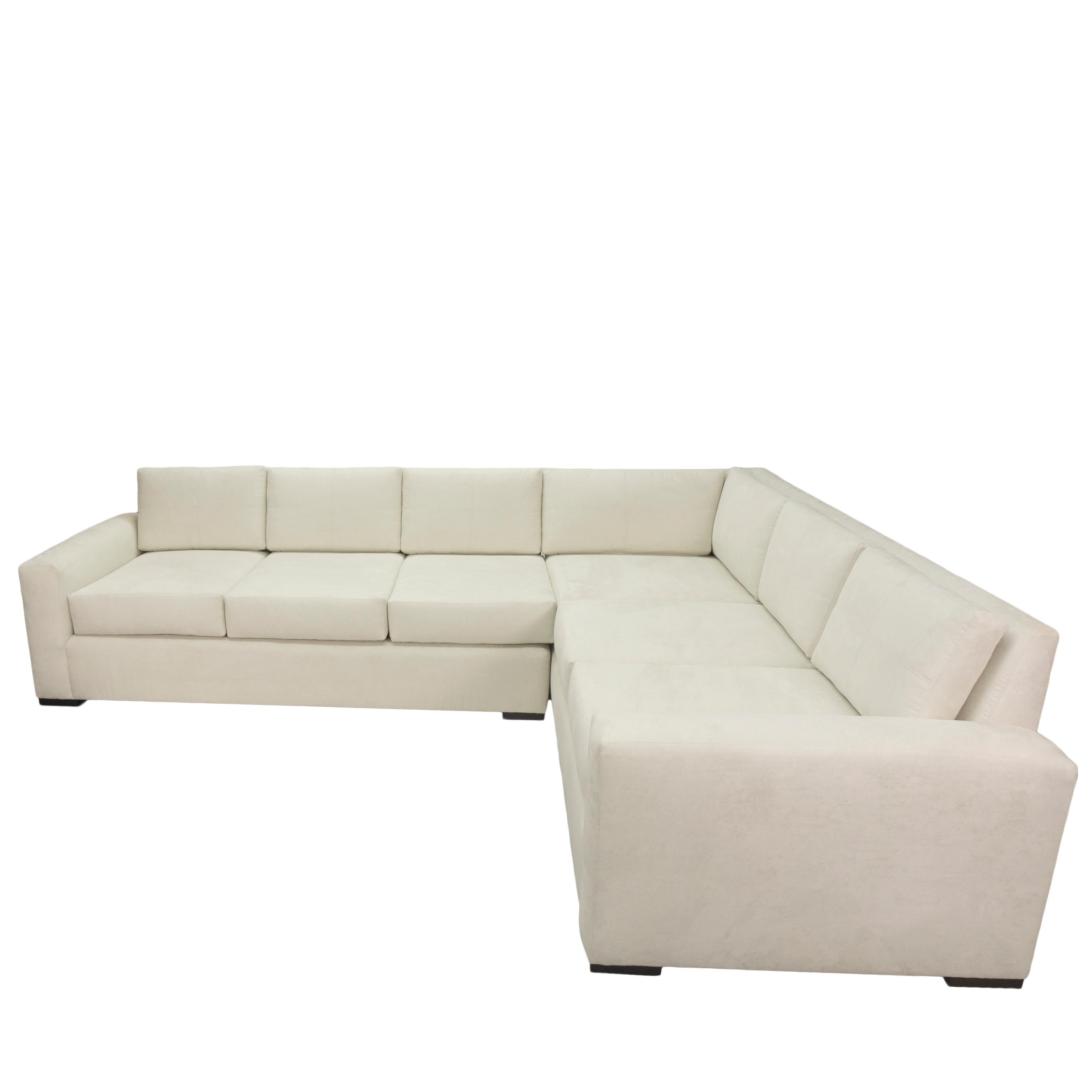 About This Piece
This customizable sectional sofa features square arms that are proportioned with the same thickness as the seat cushions, making it very easy to look at. The sectional is shown in a suede that comes in dozens of colors. Our