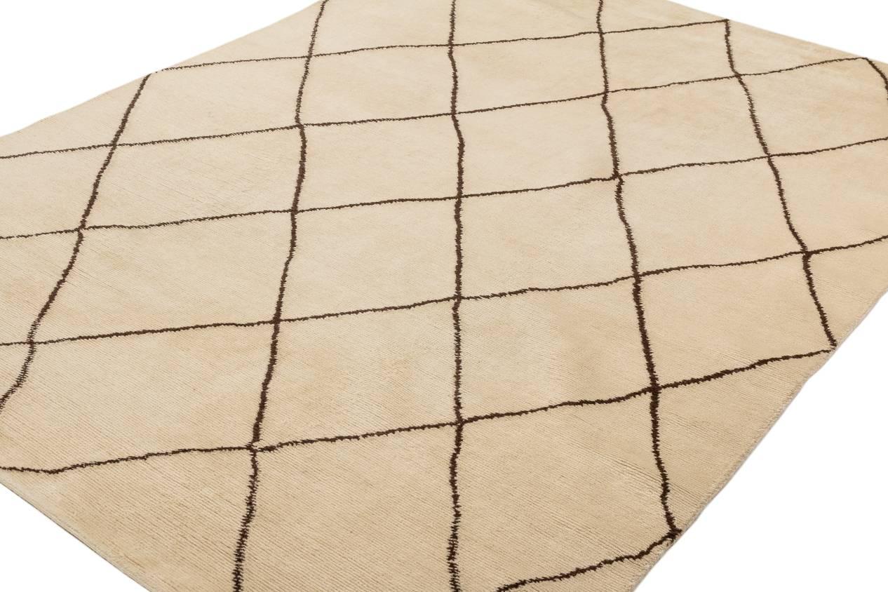 A velvety mohair rug in off-white with hints of cream, very soft and silky feeling underfoot.