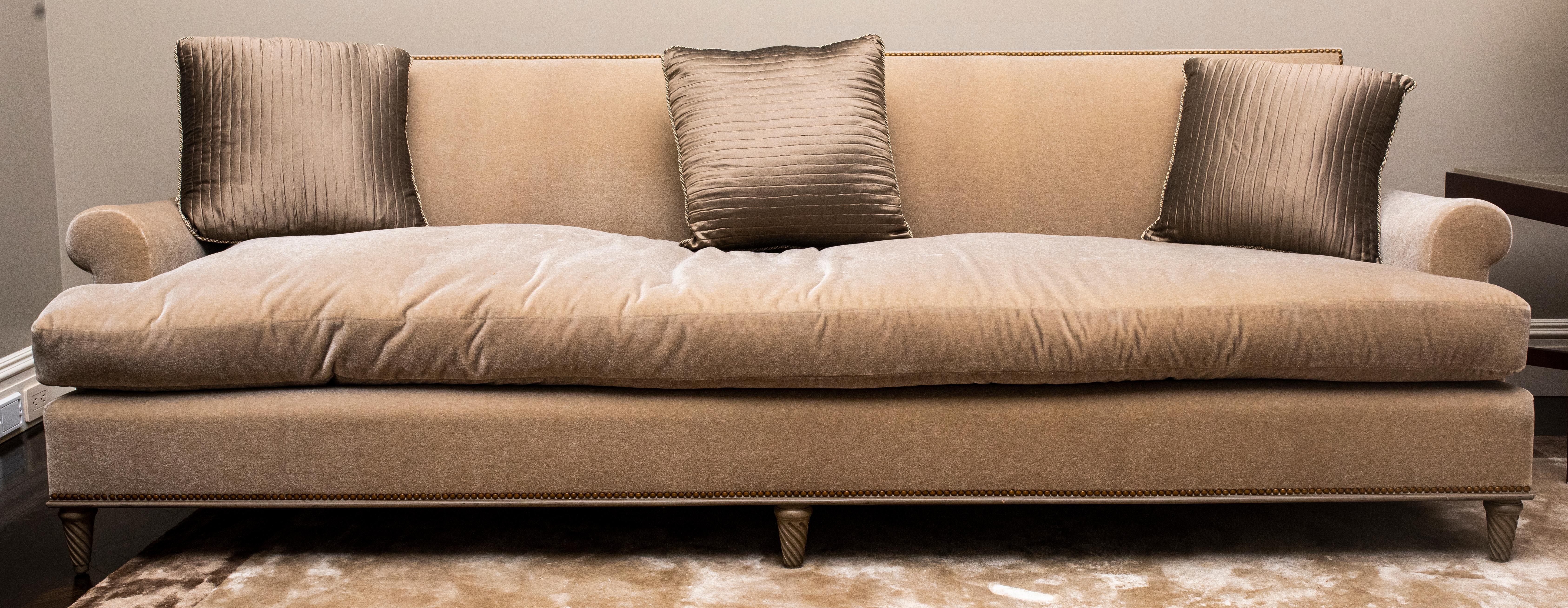 Large modern sofa upholstered in mohair. 32