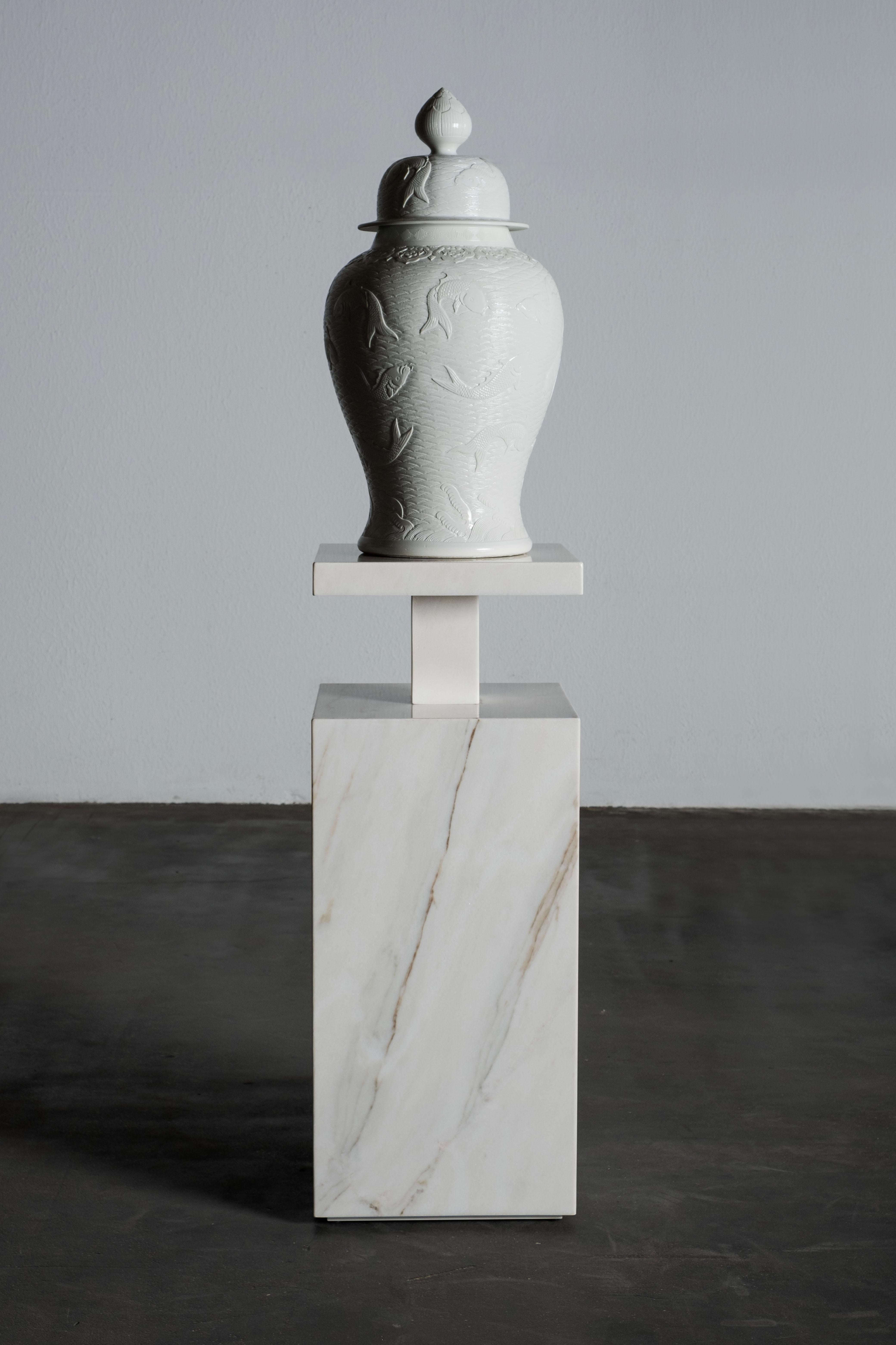Monique Pedestal Stand, Handcrafted in Portugal - Europe by Greenapple.

Monique is the perfect standing piece of art to enhance any interior. Monique is a unique design in Calacatta Cremo marble that stands out for its presence and stands on its