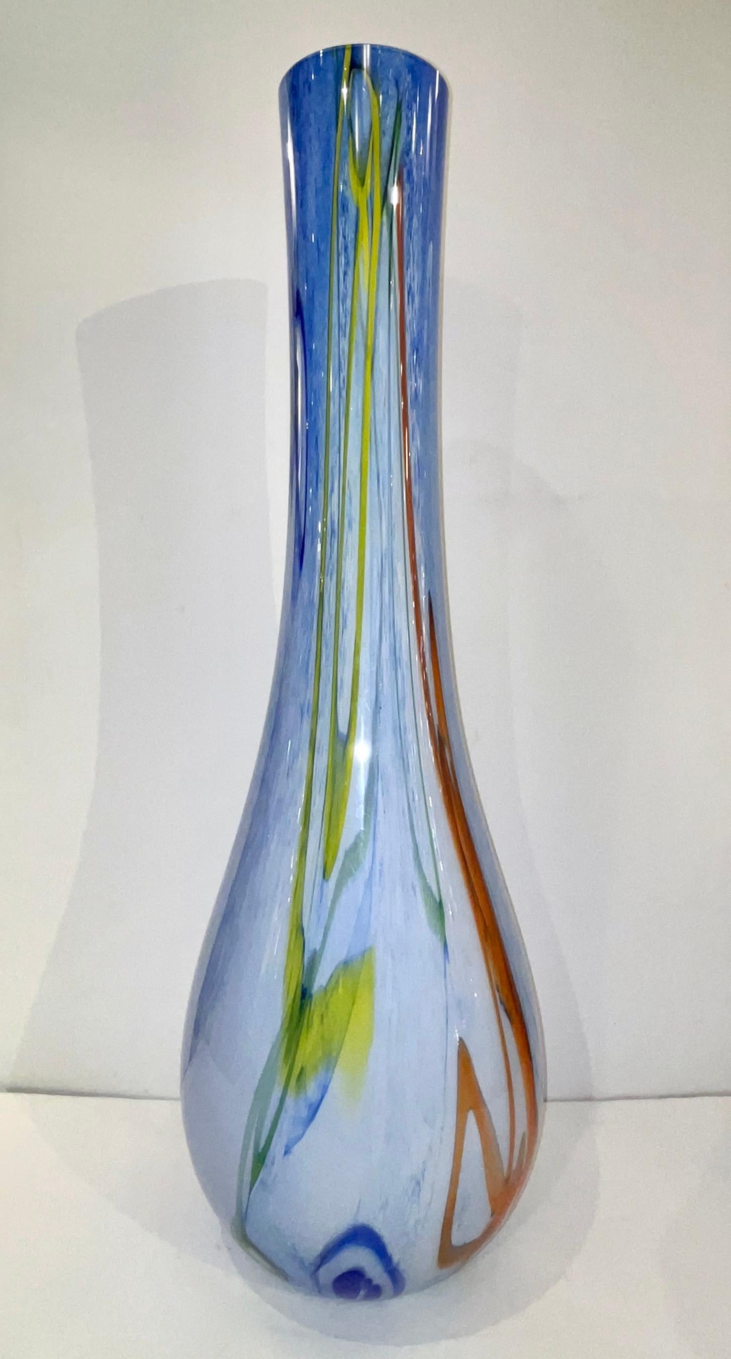 A striking huge Murano glass vase, impressive in size, a Work of Art in blown overlaid Murano glass worked like a modern painting with a sophisticated extensive swirling organic decor of overlaid elongated murrine in turquoise, azure, orange brown,