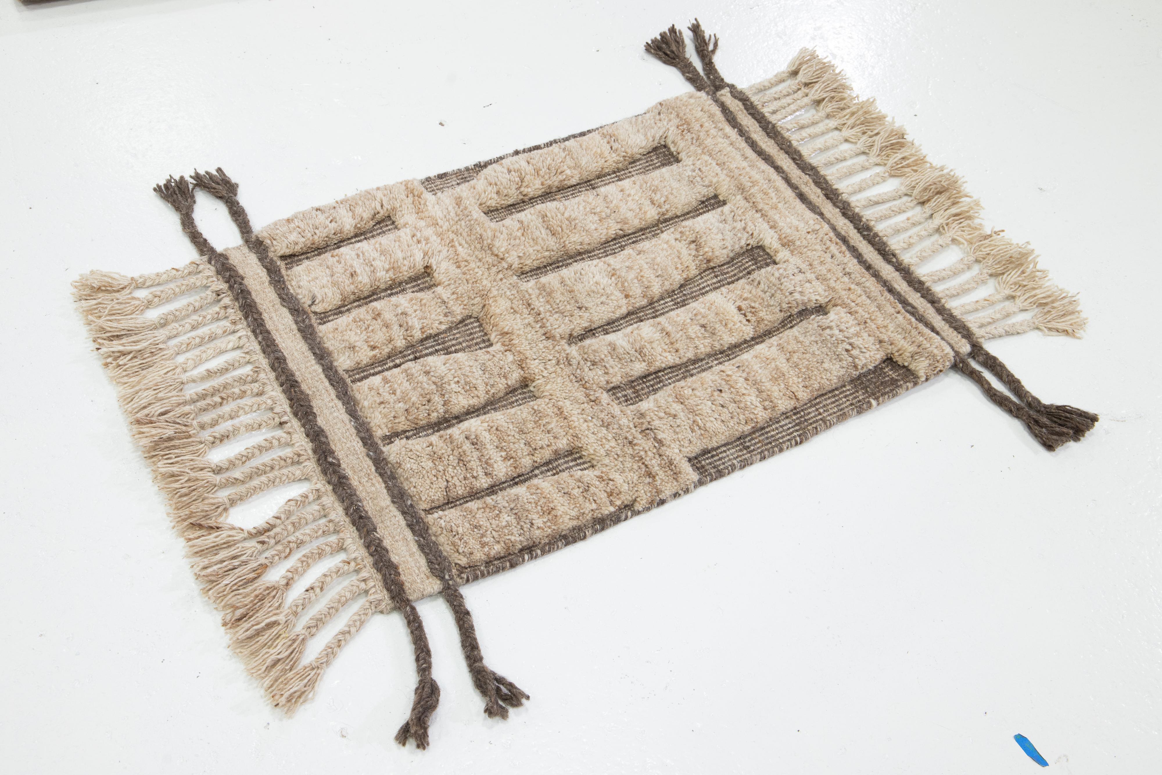 This handcrafted custom wool rug, available in multiple colors, is part of our Safi Collection. We use hand-knotted techniques for superior quality and longevity. 
The estimated lead time for customs is 15-20 weeks.
Material: Wool
Techniques: