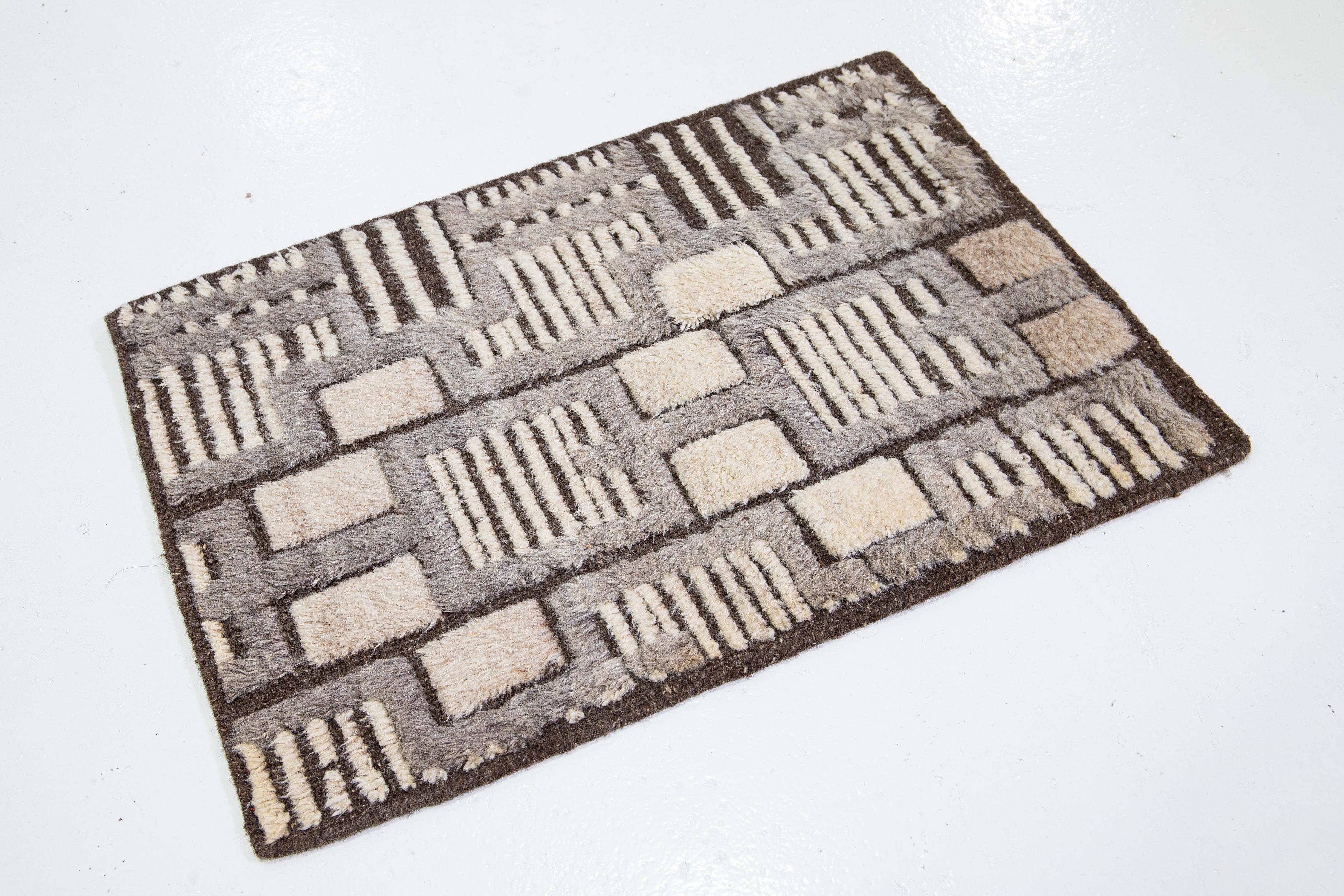 This handcrafted custom wool rug, available in multiple colors, is part of our Safi Collection. We use hand-knotted techniques for superior quality and longevity. 
The estimated lead time for customs is 15-20 weeks.
Material: Wool
Techniques: