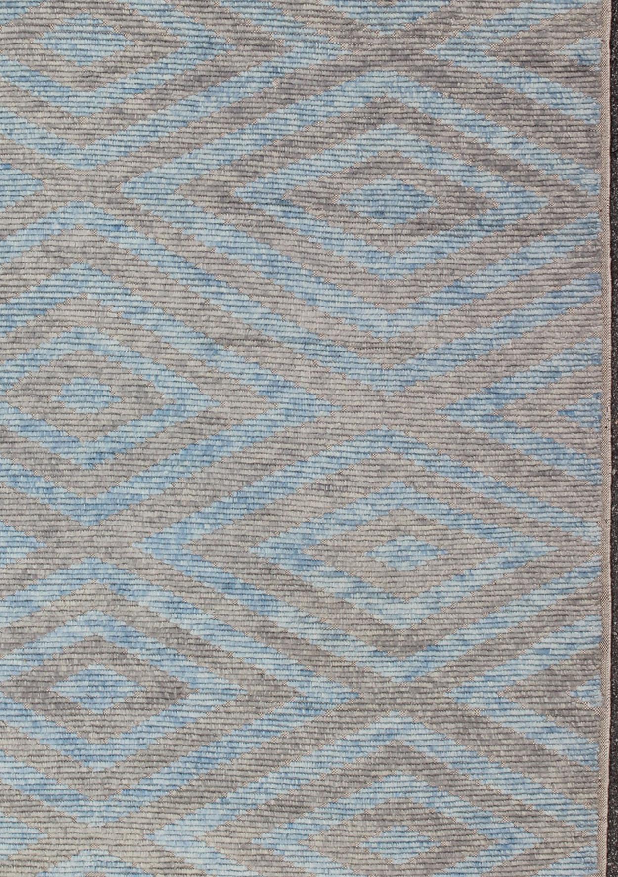 Measures: 10' x 14'.
Moroccan design rug with light blue, light gray and multi layered Diamond Design. Moroccan design. Keivan Woven Arts, rug OB-9265407, country of origin / type: India/ Moroccan

This hand-knotted Moroccan rug features a beautiful