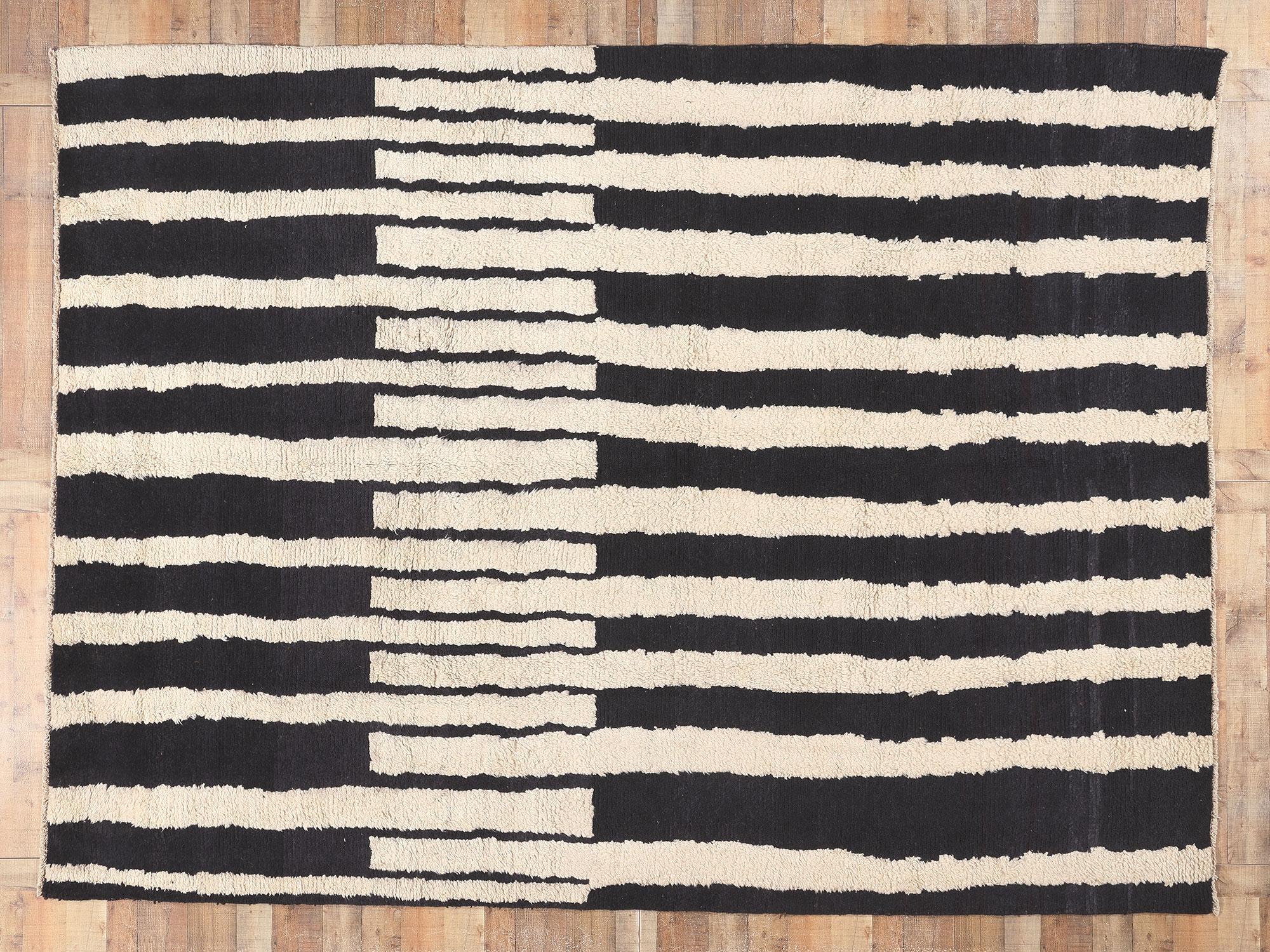 81011 Bauhaus Moroccan Rug, 09'01 x 12'02. 
?Emanating Bauhaus style with incredible detail and texture, this modern Moroccan area rug is a captivating vision of woven beauty. The eye-catching linear design and simplistic colorway woven into this