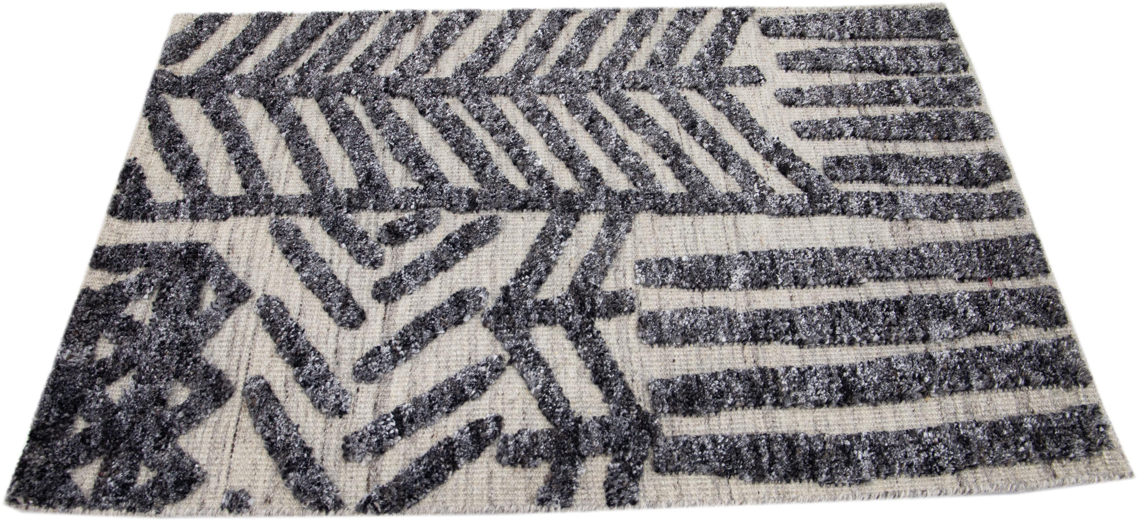 Apadana's Modern Moroccan Style wool custom rug. Custom sizes and colors made-to-order.

Material: 80 Wool and 20 Cotton.
Techniques: Hand-Loomed.
Style: Moroccan.
Lead time: Approx. 15-16 weeks available.
Colors: As shown, other custom colors are