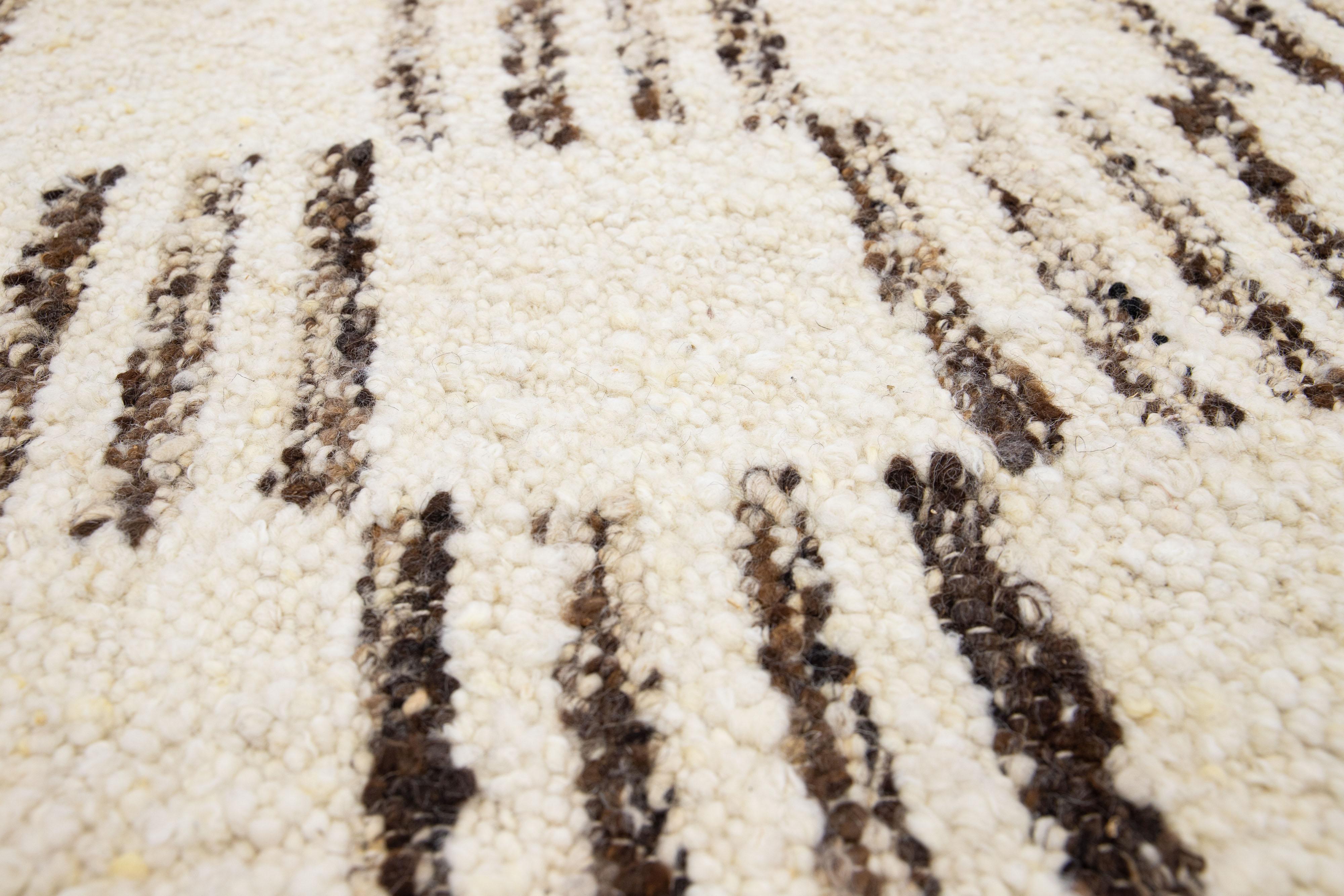 Apadana's Modern Moroccan Style wool custom rug. Custom sizes and colors made-to-order.

Material: 80 Wool and 20 Cotton.
Techniques: Hand-Woven-Durry.
Style: Moroccan.
Lead time: Approx. 15-16 weeks available.
Colors: As shown, other custom colors