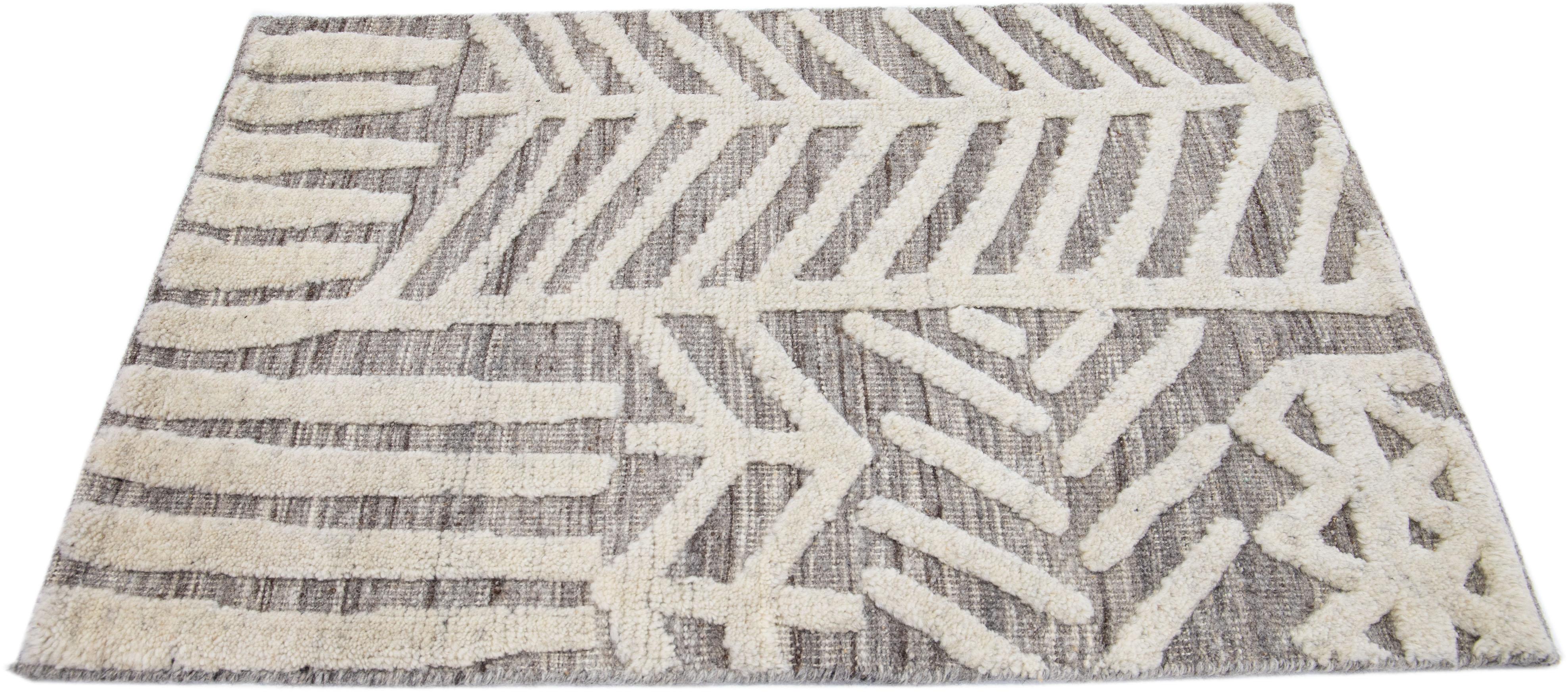 Apadana's Modern Moroccan Style wool custom rug. Custom sizes and colors made-to-order.

Material: 80 Wool and 20 Cotton.
Techniques: Hand-Loomed.
Style: Moroccan.
Lead time: Approx. 15-16 weeks available.
Colors: As shown, other custom colors are