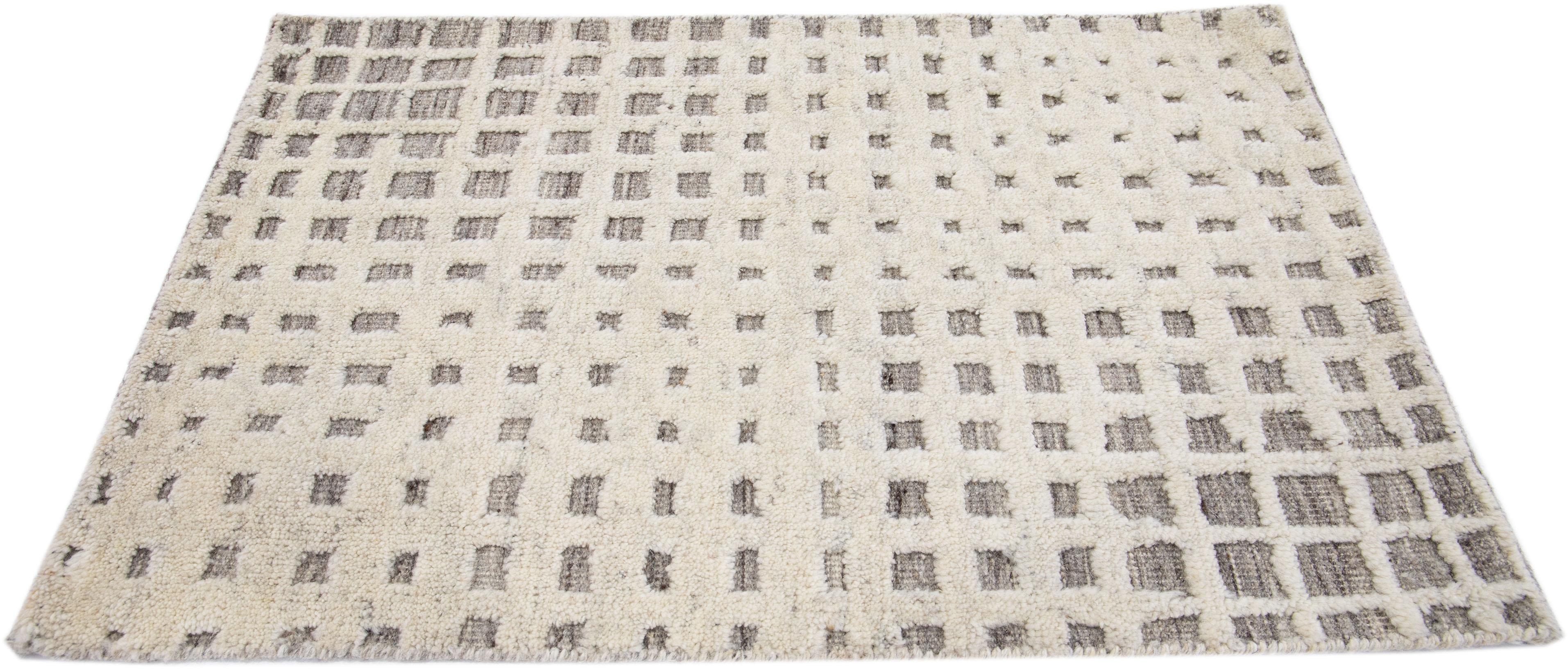 Apadana's Modern Moroccan Style wool custom rug. Custom sizes and colors made-to-order.

Material: 80 Wool and 20 Cotton.
Techniques: Hand-Loomed.
Style: Moroccan.
Lead time: Approx. 15-16 weeks available.
Colors: As shown, other custom colors are