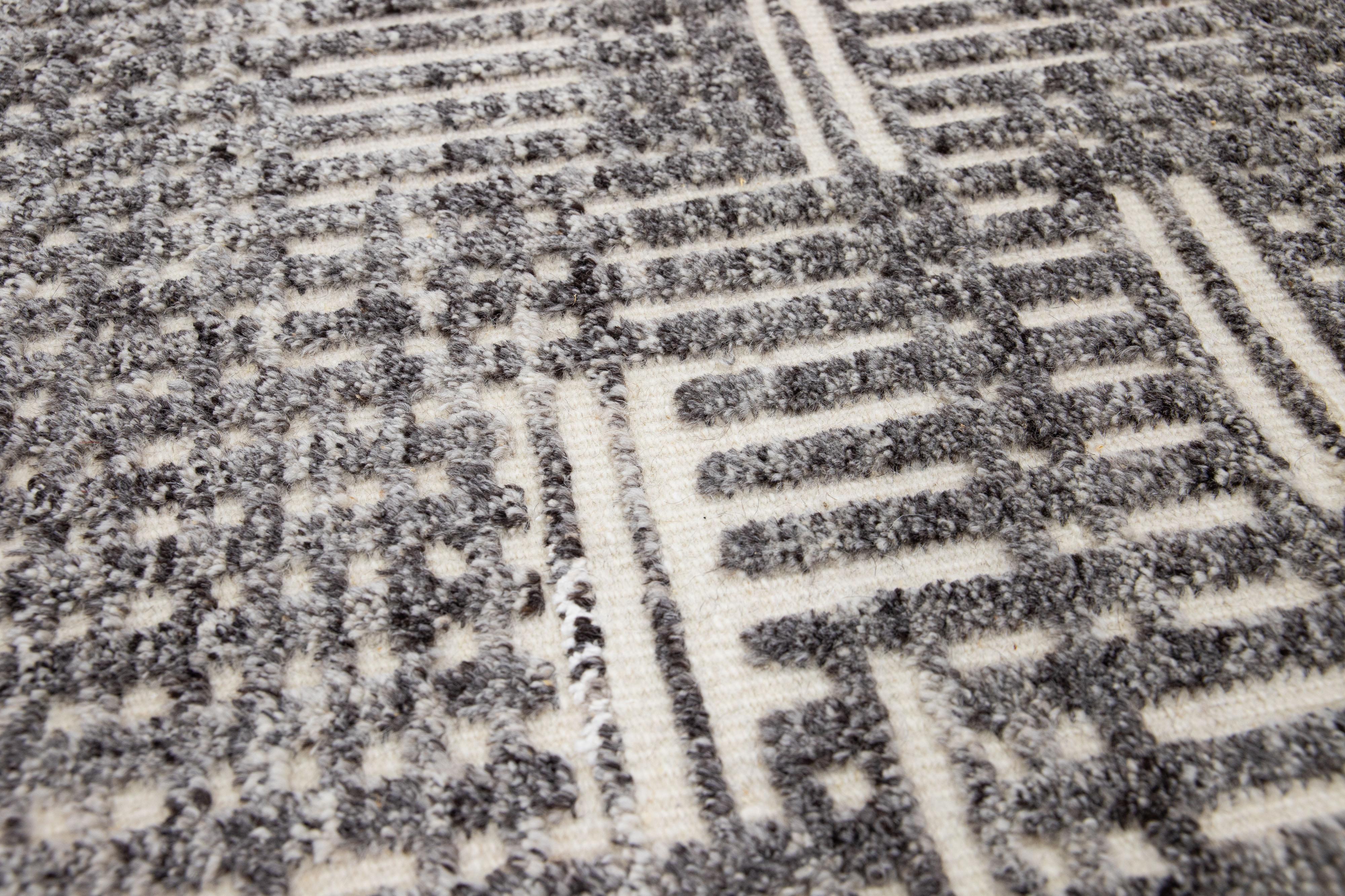 Apadana's Modern Moroccan Style wool custom rug. Custom sizes and colors made-to-order.

Material: 80 Wool and 20 Cotton.
Techniques: Hand-Loomed.
Style: Moroccan.
Lead time: Approx. 15-16 weeks available.
Colors: As shown, other custom colors are
