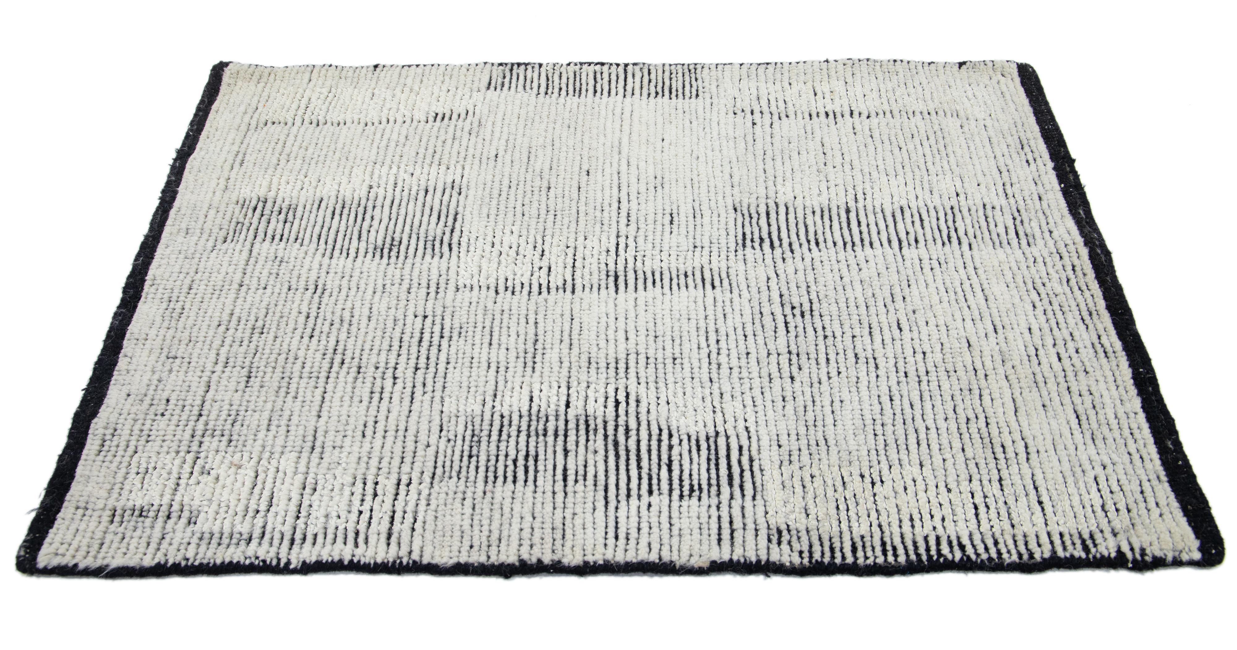 Apadana's Modern Moroccan style wool custom rug. Custom sizes and colors made-to-order. 

Material: Wool 
Techniques: Hand-Knotted
Style: Moroccan 
Lead time: Approx. 15-16 wks available 
Colors: As shown, other custom colors are available.