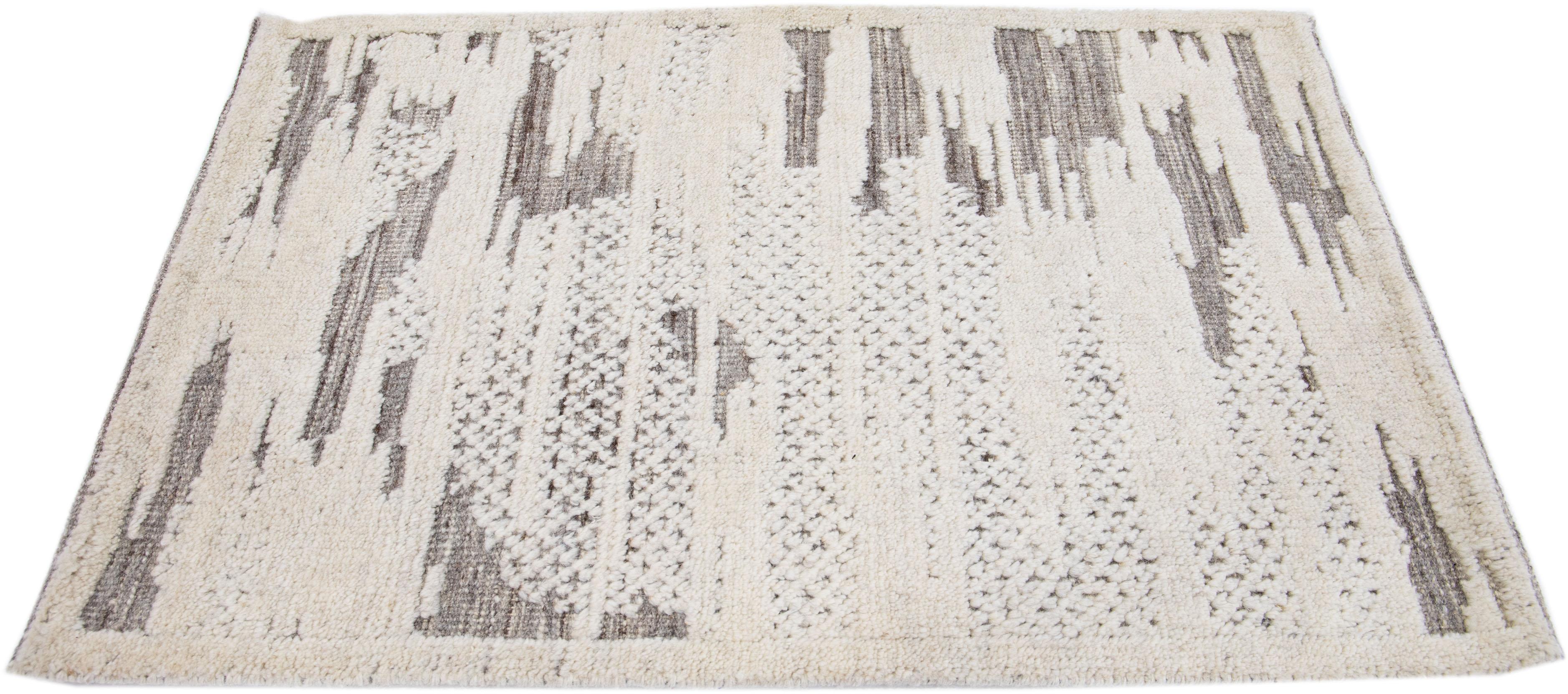Apadana's Modern Moroccan Style wool custom rug. Custom sizes and colors made-to-order.

Material: 80 Wool and 20 Cotton.
Techniques: Hand-Loomed.
Style: Moroccan.
Lead time: Approx. 15-16 weeks available.
Colors: As shown, other custom colors are