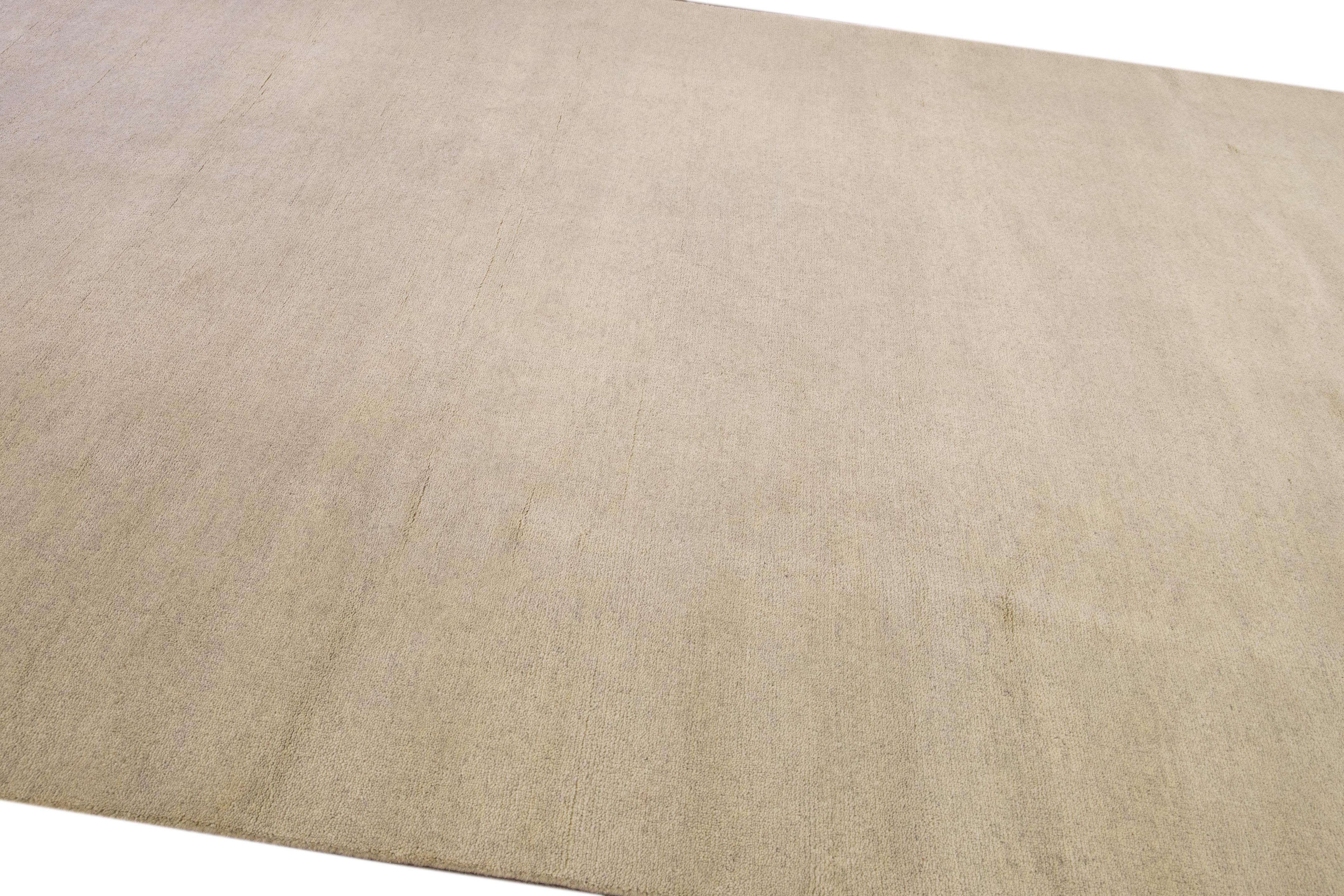 Hand-Knotted Modern Moroccan Style Handmade Solid Beige Wool Rug For Sale