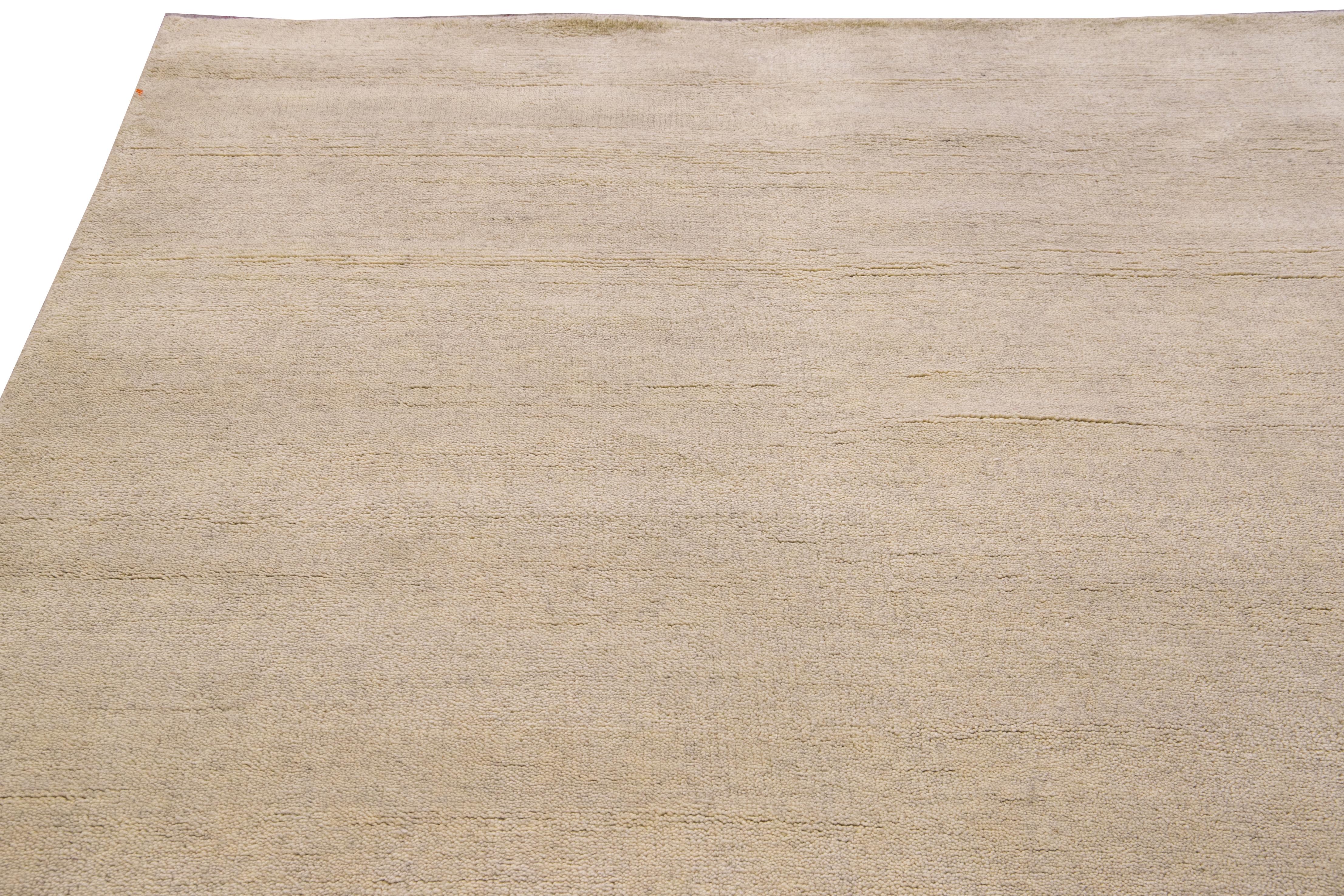 Contemporary Modern Moroccan Style Handmade Solid Beige Wool Rug For Sale