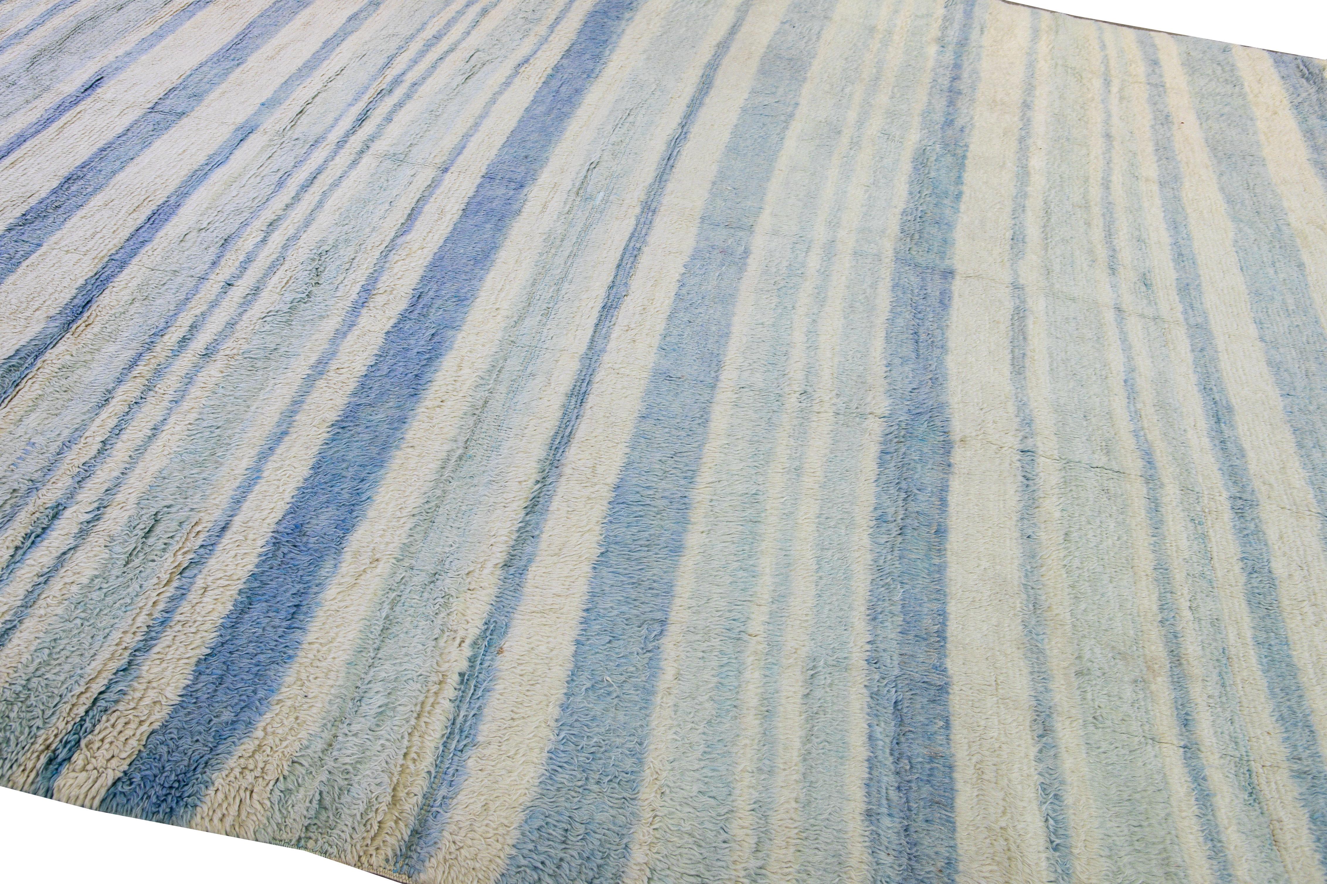Contemporary Modern Moroccan Style Handmade Stripe Pattern Ivory and Blue Wool Rug For Sale