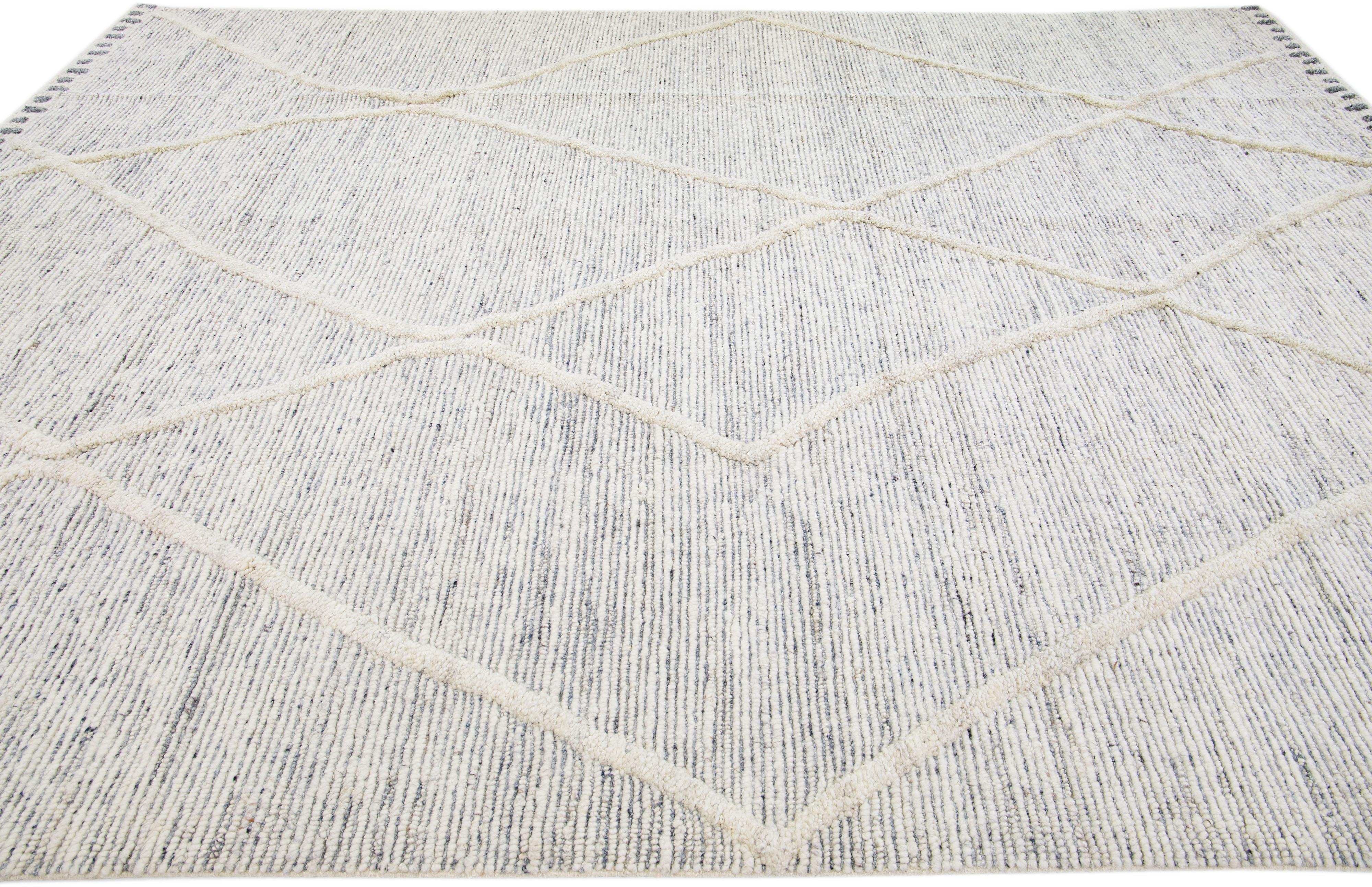 Hand-Knotted Modern Moroccan Style Ivory Handmade Wool Rug with a Tribal Motif For Sale