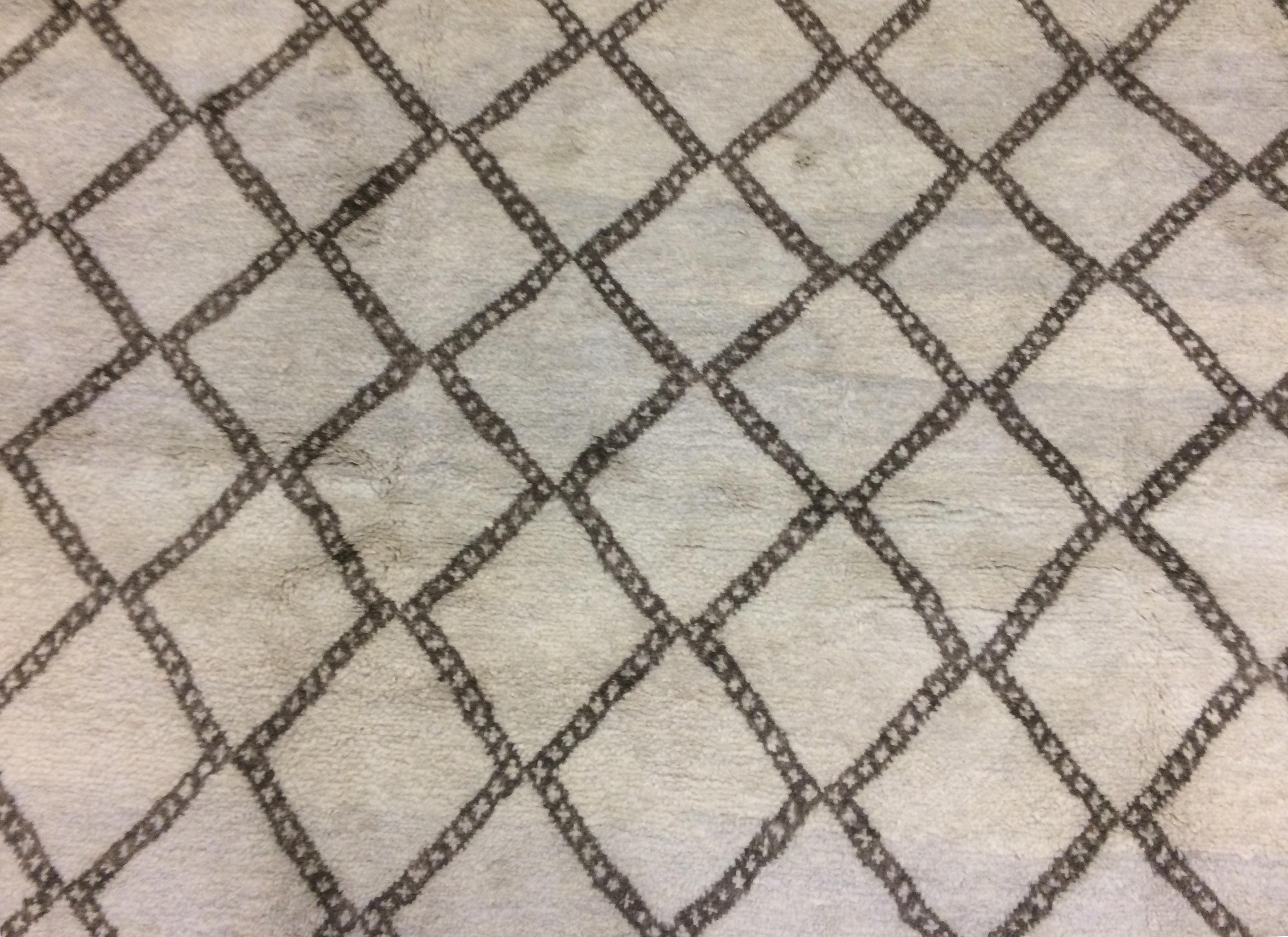 Modern Moroccan rug with bold diamond design,

circa 2015.

Measures: 8' 3