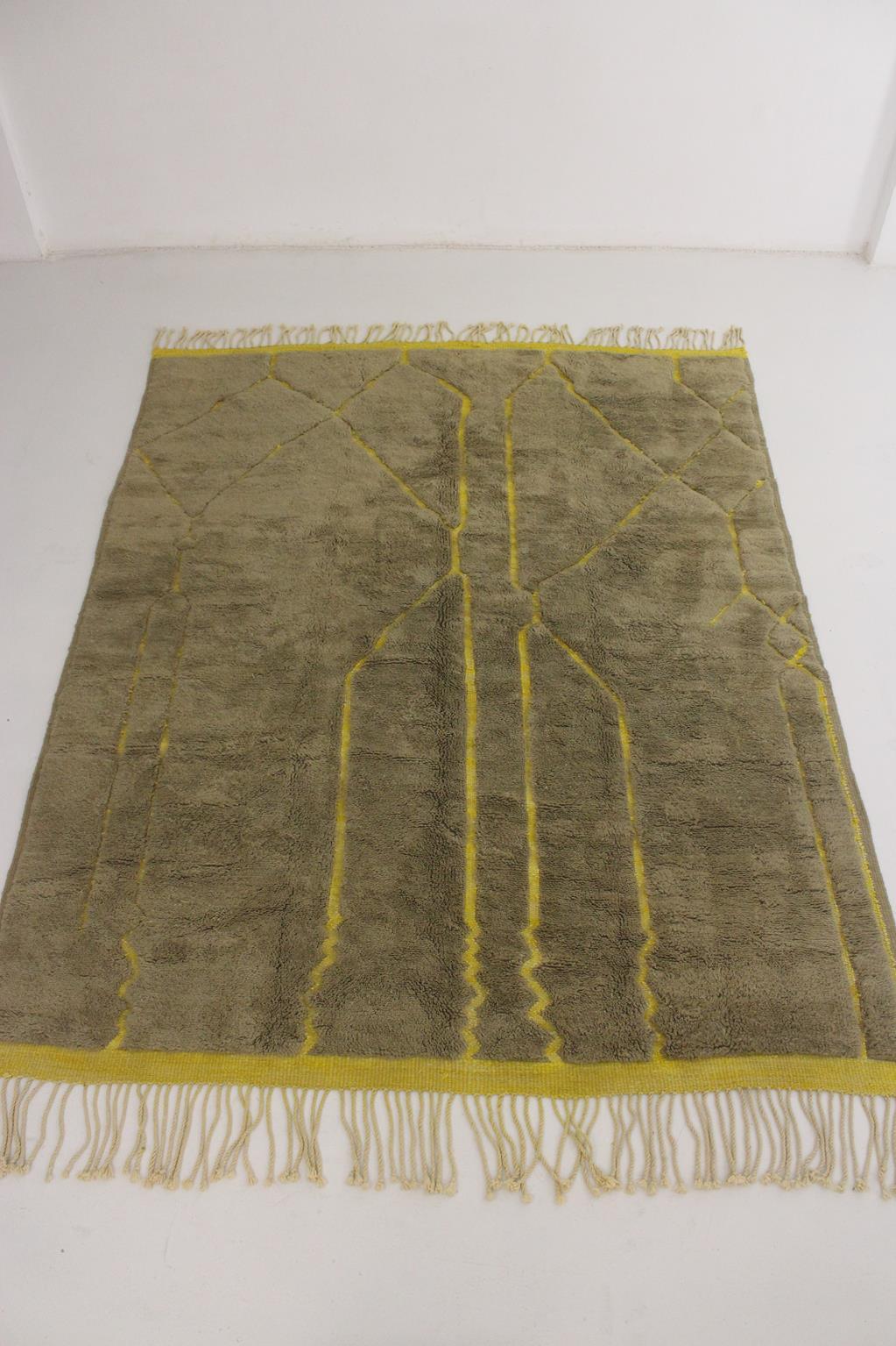 This large, modern-style, Mrirt rug was made by artisans in the area of Khenifra, Atlas Mountains, Morocco. Groups of women there still weave by hand on traditional, vertical looms to make these new rugs.

This rug is made of premium quality, soft