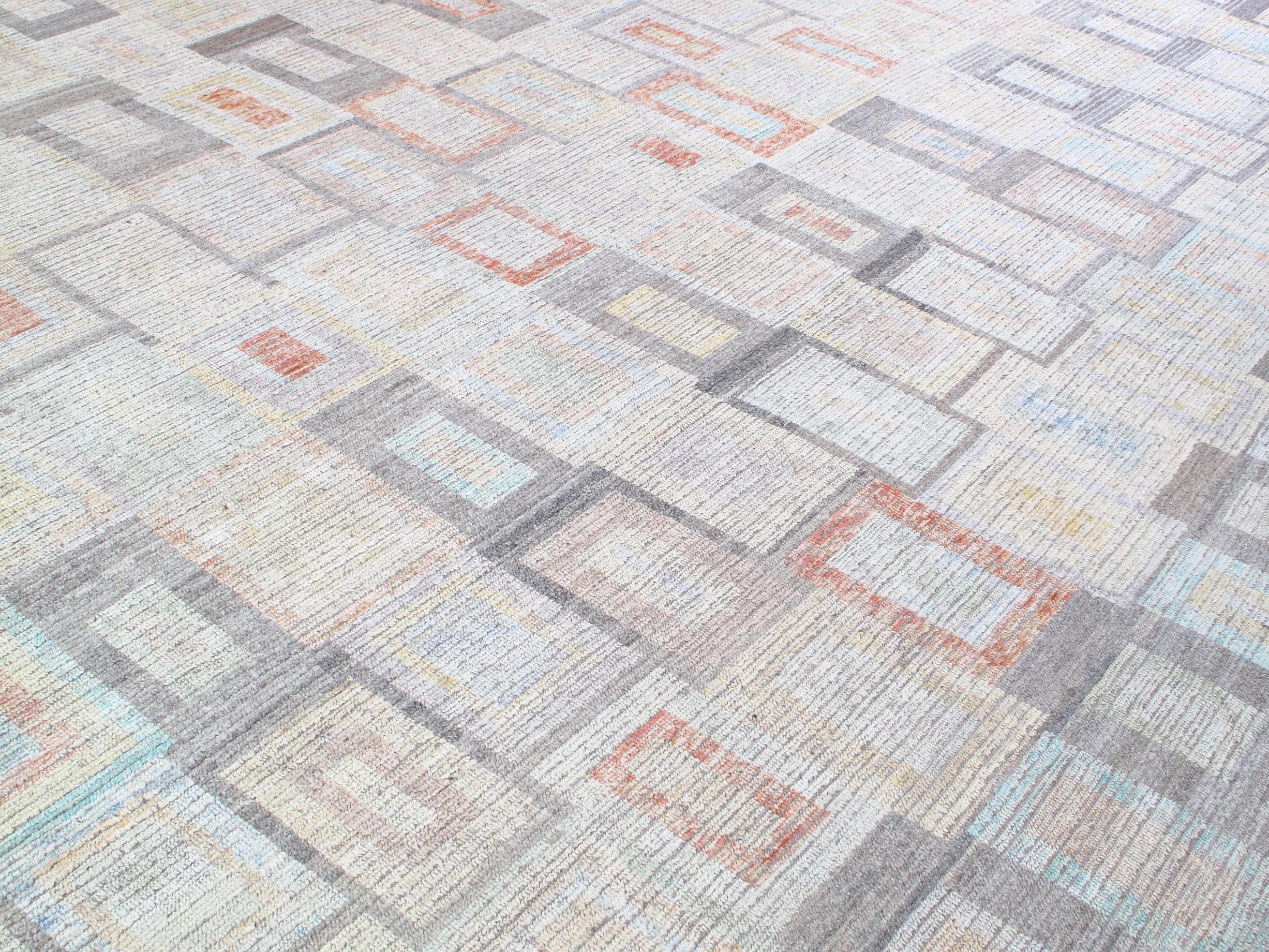 This modern, pastel rug is hand-knotted with 100% hand-spun wool. With the use of all natural vegetable dyes, we have created the perfect soft-hued palette to brighten up any room. Custom sizes and colors available.