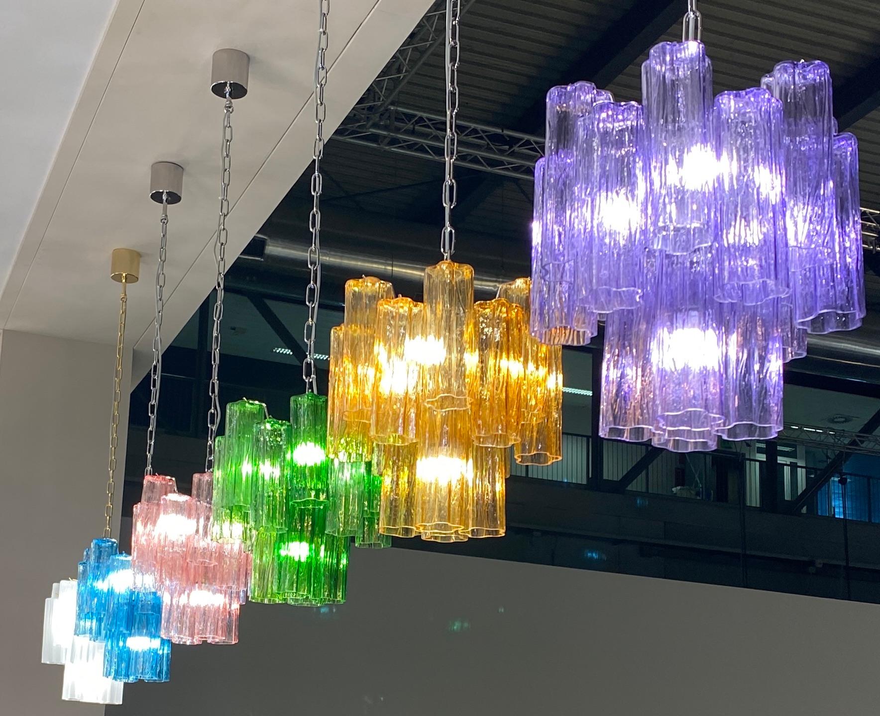 Amazing chandelier with multicolor combination considering the uniqueness with amber, pink, amethyst, green ,blu, ice ... color precious Murano glasses. Each chandelier with glass blown tronchi elements supported by a chrome frame
with 4 E 27 light