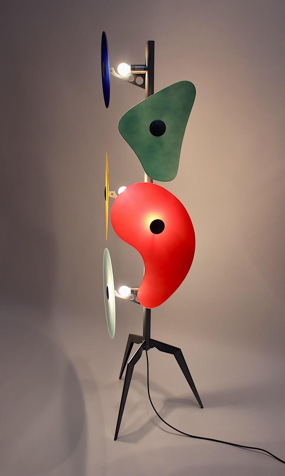 Modern multicolored vintage floor lamp model Orbital Terra by Ferrucchio Laviani, which was designed 1992 for Foscarini, Italy.
The multicolored lamp shades from satined glass with different shapes form with the metal frame an outstanding