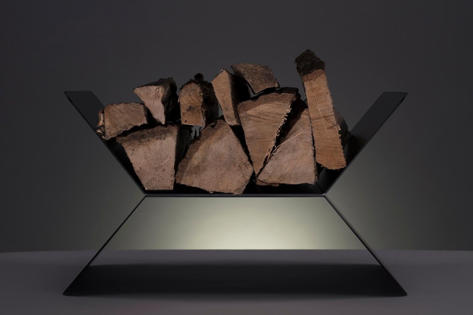 Collection I: X Rack

The X Rack is an elegant, minimal, and modern object that is both sculptural and functional - a crisp silhouette creating the illusion that the form and its contents are suspended weightlessly.

