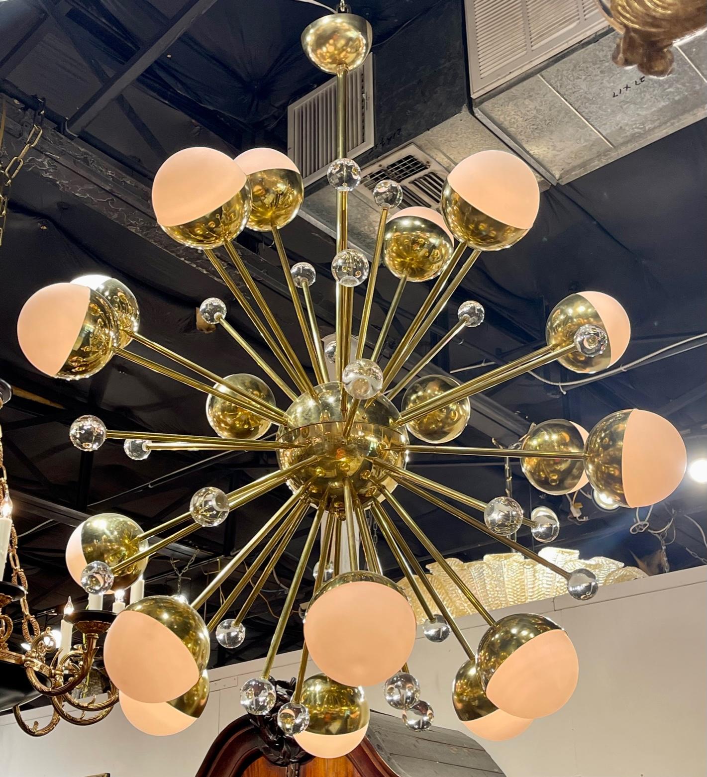 Exquisite large scale modern brass and pink and clear Murano glass sputnik chandelier. A very beautiful chandelier that is sure to impress! Fabulous!!