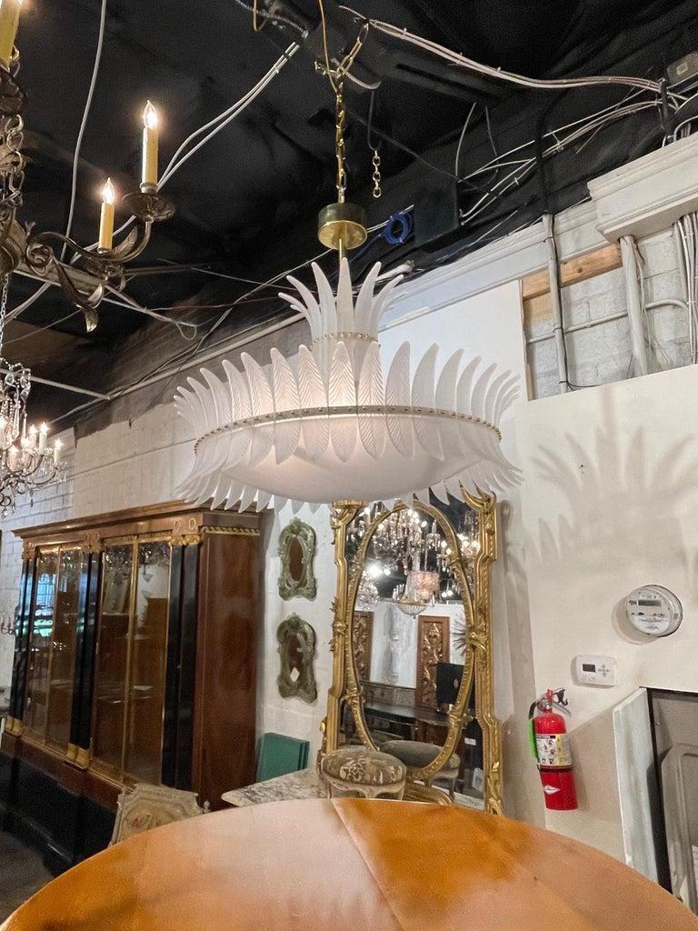 Beautiful modern Murano glass Art Deco style chandelier. Featuring textured frosted glass in the shape of plumes. Sure to impress!!