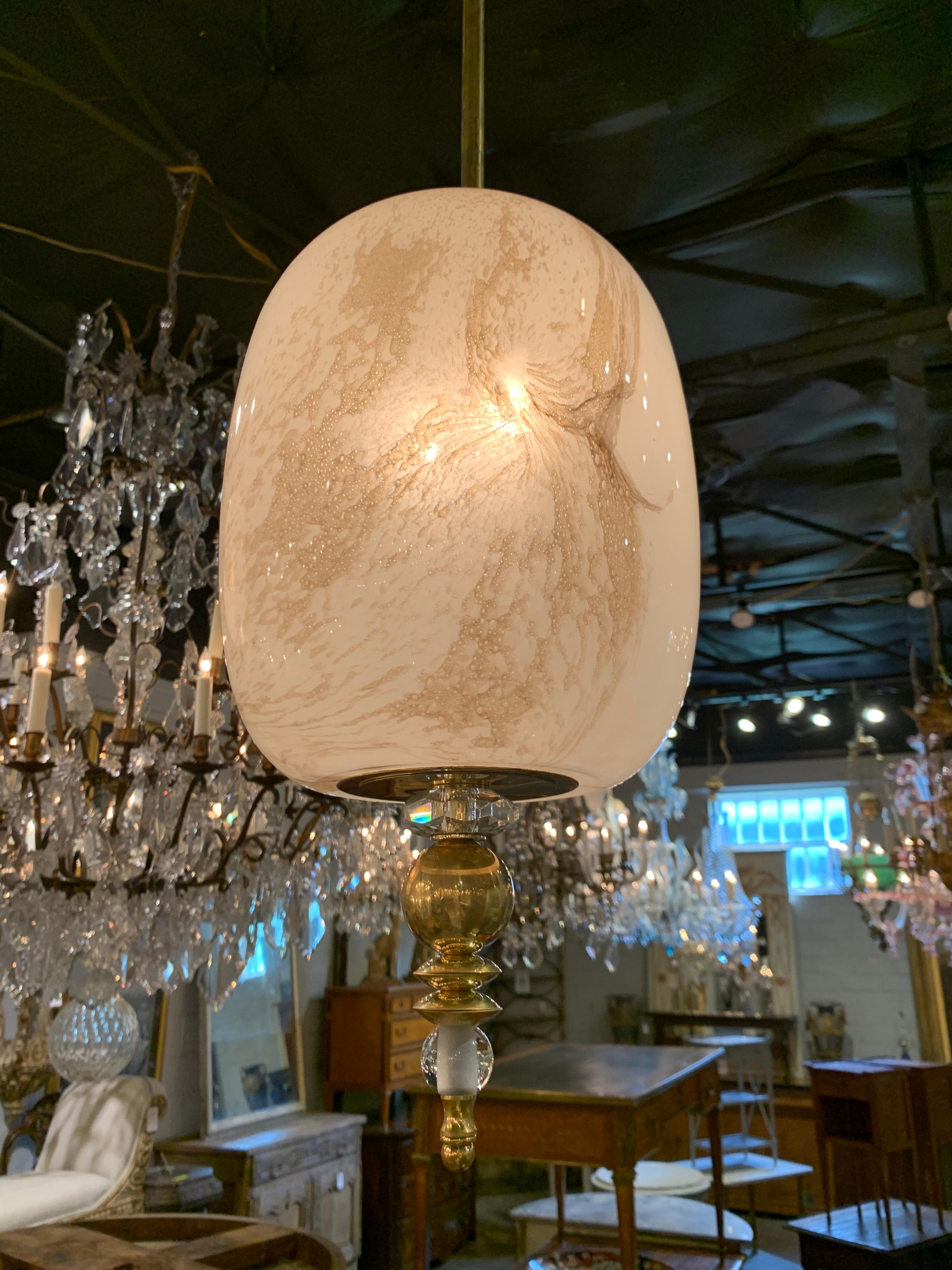 Outstanding modern Murano glass pendant fixtures. Beautifully swirling pattern of gold and white with brass details. Sold separately but pairs are available. True works of art. Fantastic!