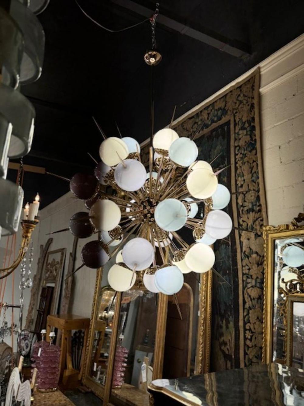 Exceptional modern Murano glass multi color pastel globe sputnik chandelier. Circa 2000. The chandelier has been professionally rewired, comes with matching chain and canopy. It is ready to hang! 46