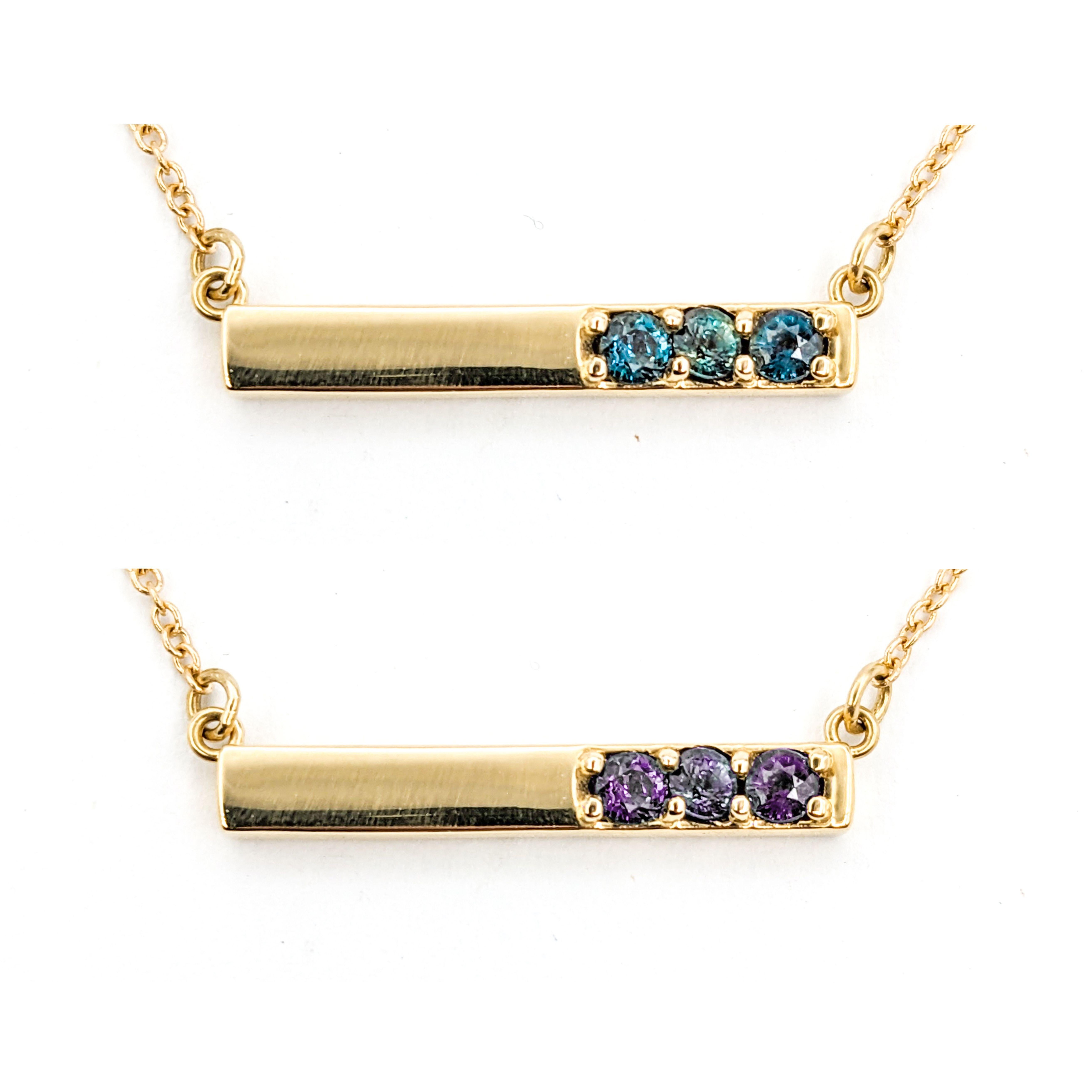 Modern Natural Alexandrite Bar Necklace in Yellow Gold 

Presenting this exquisite necklace, fashioned from 14k yellow gold, which features a graceful 3-stone bar set with .25ctw round Brazilian Alexandrite. Known for its stunning color-change