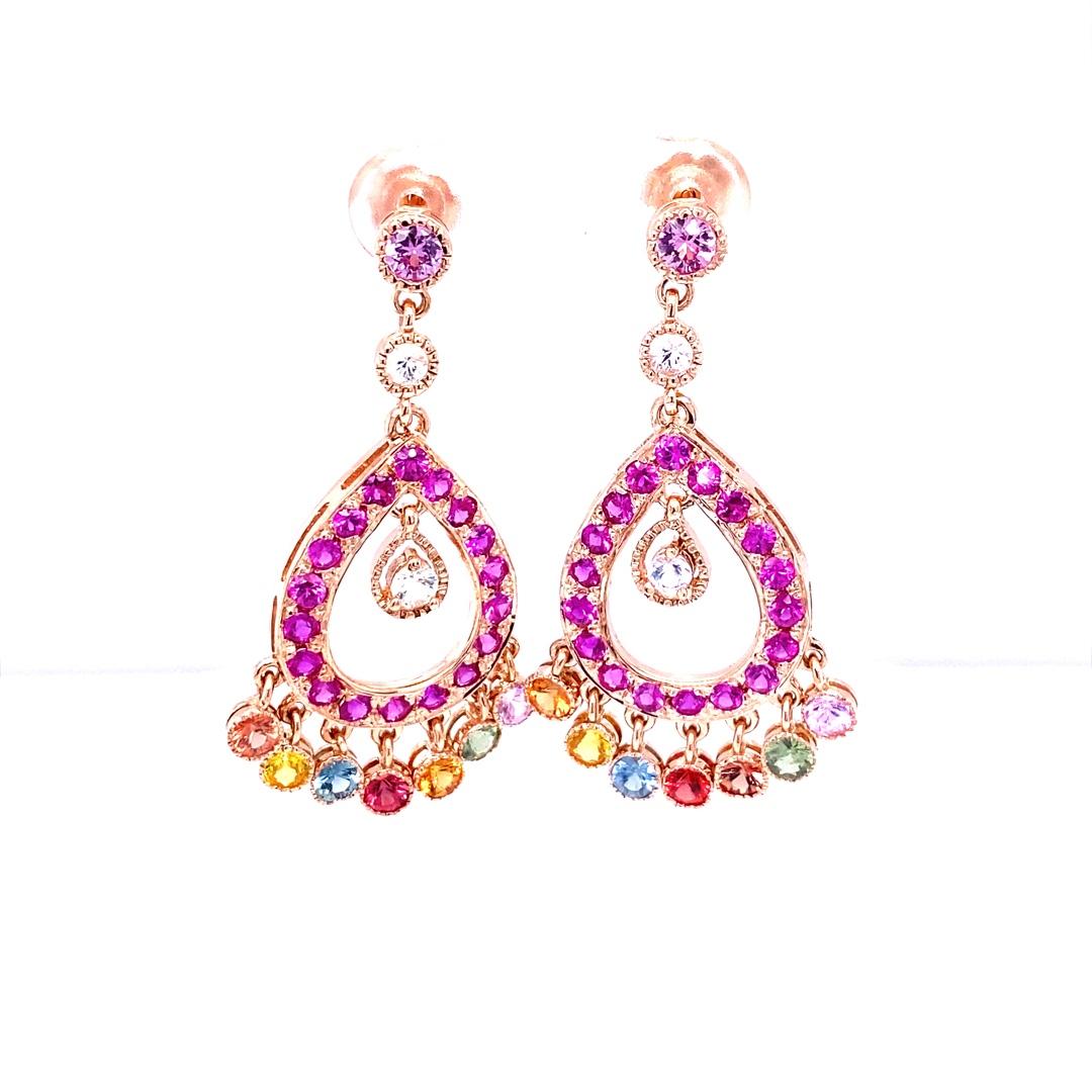 Modern Natural Gemstone Sapphire 14K Rose Gold Chandelier Earrings

These gorgeous earrings are a one of a kind must have in your accessory wardrobe.  There are 56 natural Multi-Colored Sapphires that weigh 5.12 Carats.  The length of the earrings