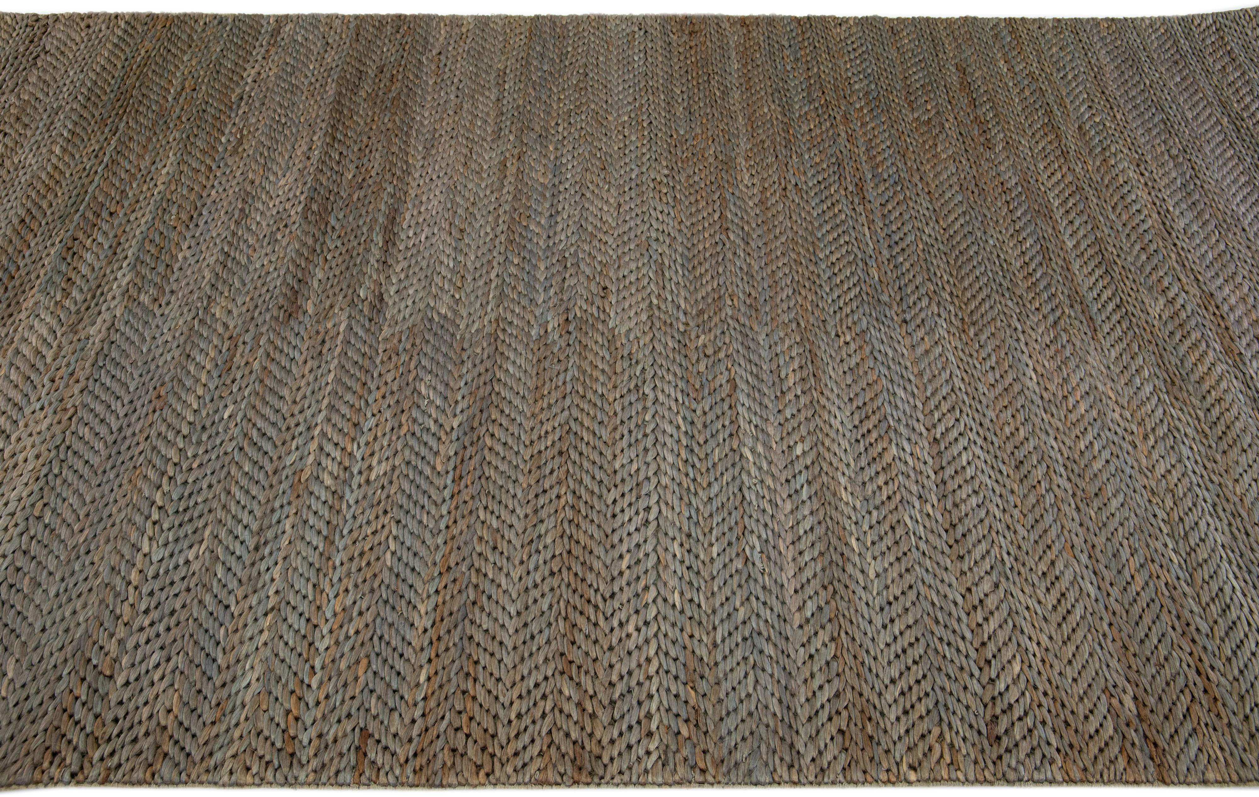 Indian Modern Natural Texture Hand Woven Jute & Cotton Area Rug with Teal Color For Sale