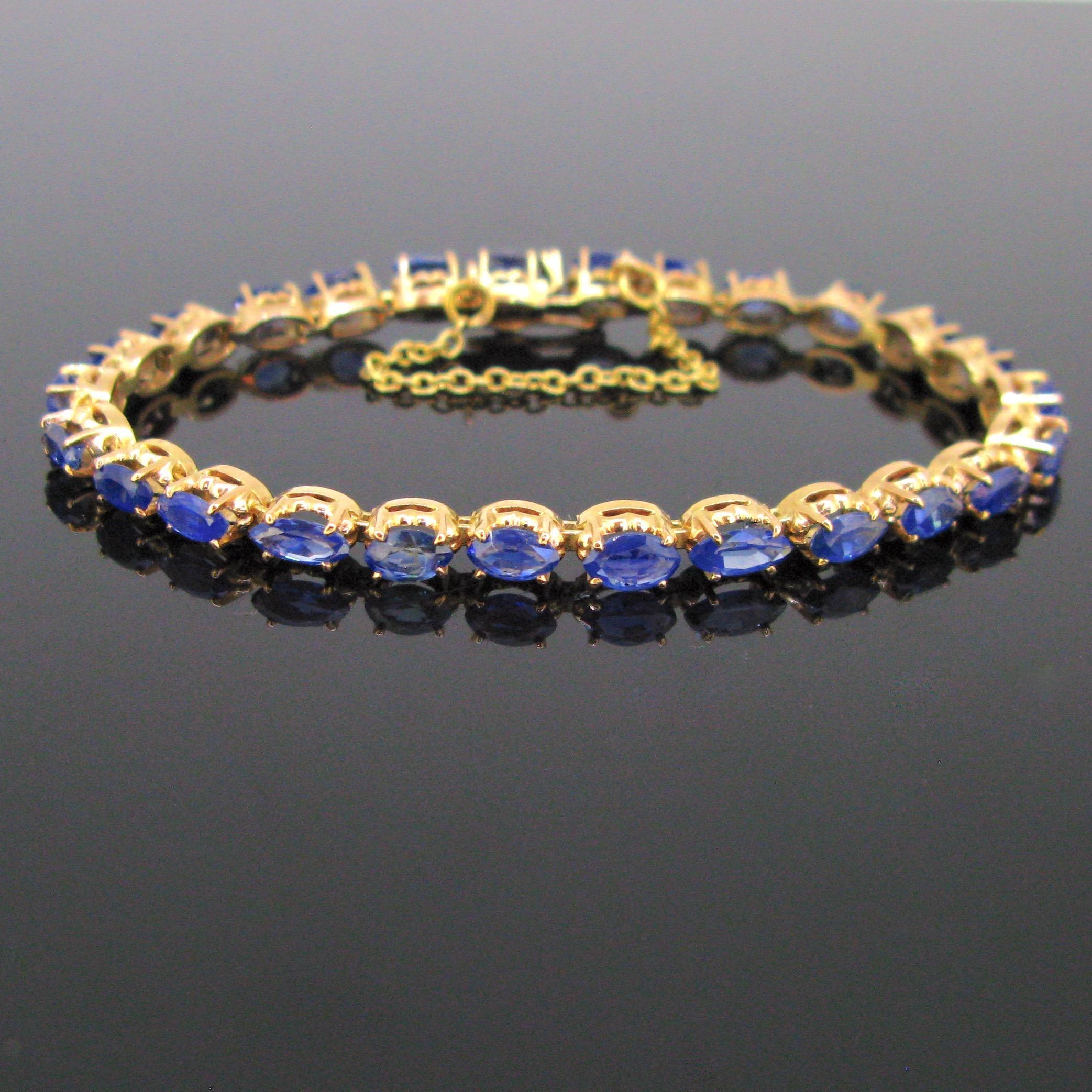 Weight:	11.67gr


Metal:		18kt yellow and rose gold


Stones:	26 Sapphires
•	Cut:	Navette
•	Total carat weight:	4ct approximately


Hallmarks: 	18K
	French, eagle’s head 


Condition:	Very Good


Comments:	This bracelet is set with 26 navette cut