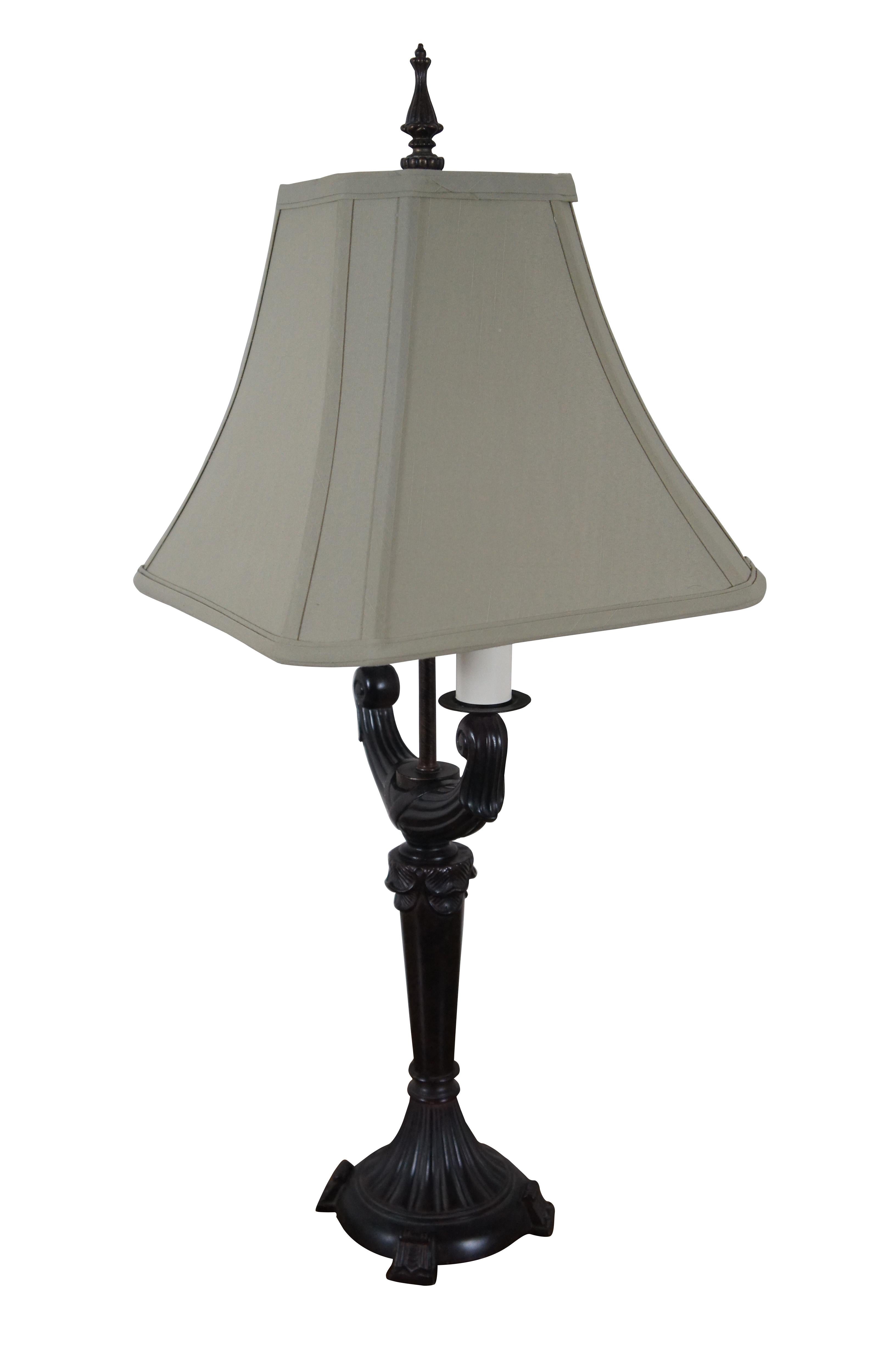 Modern resin table lamp in the shape of a neoclassical column with double arm candelabra style top and ornate finial, finished in brushed burgundy / dark brown paint. Includes a sage green, square cut-corner shade.

Dimensions:
8.5” x 5.5” x
