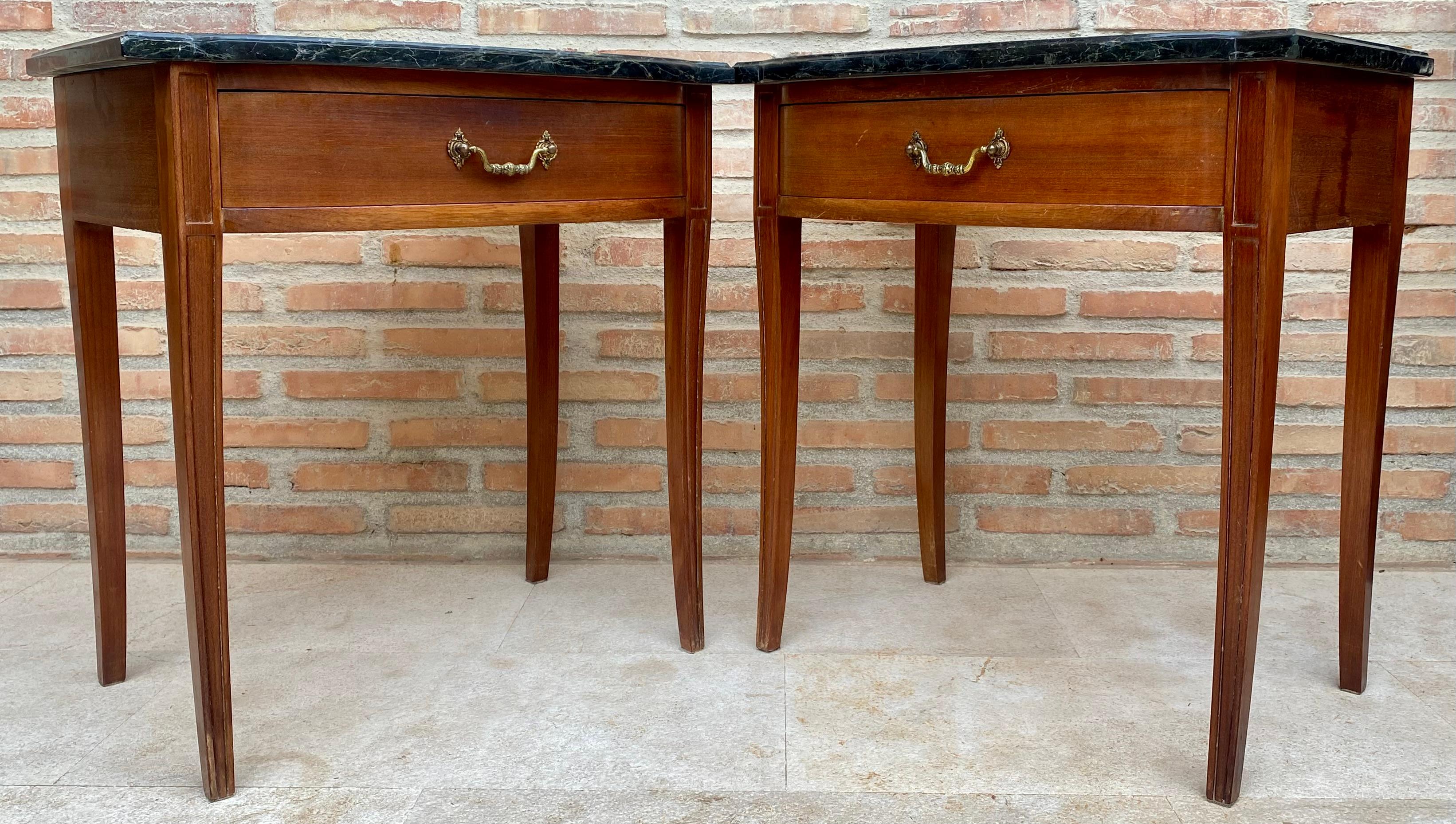 
Early 20th century Spanish Console Table with One Drawer. Early 20th Spanish console table with two pedestal legs joined by a carved bar stretcher.